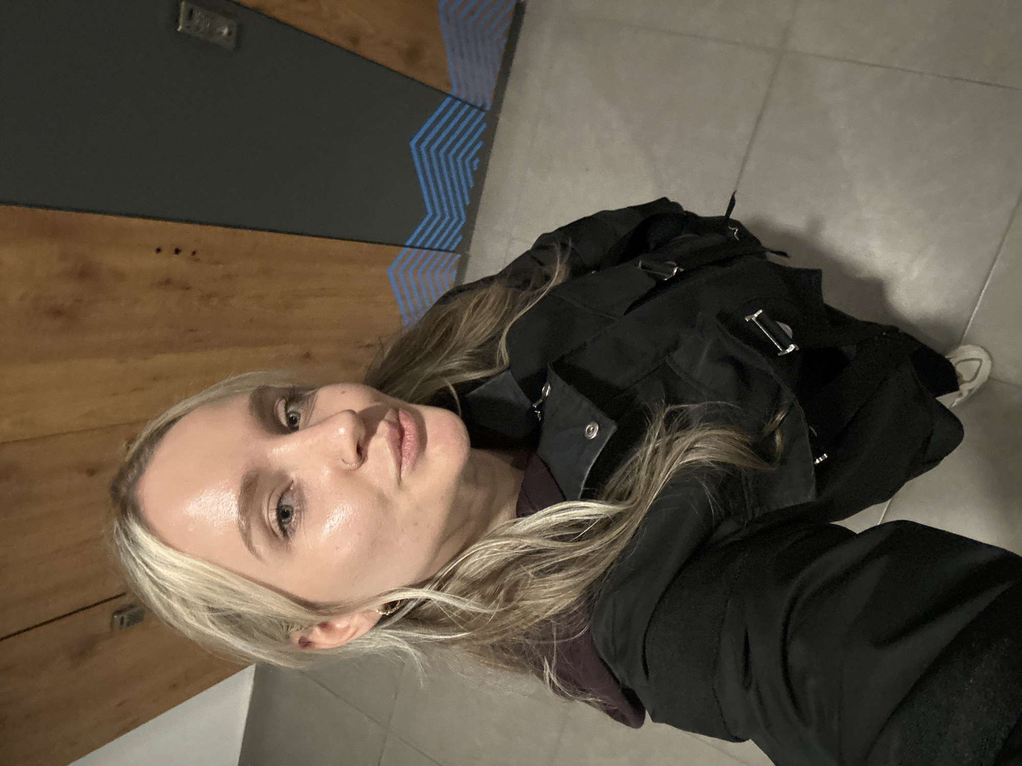 Woman records selfie content indoors in Esenyurt, Turkey