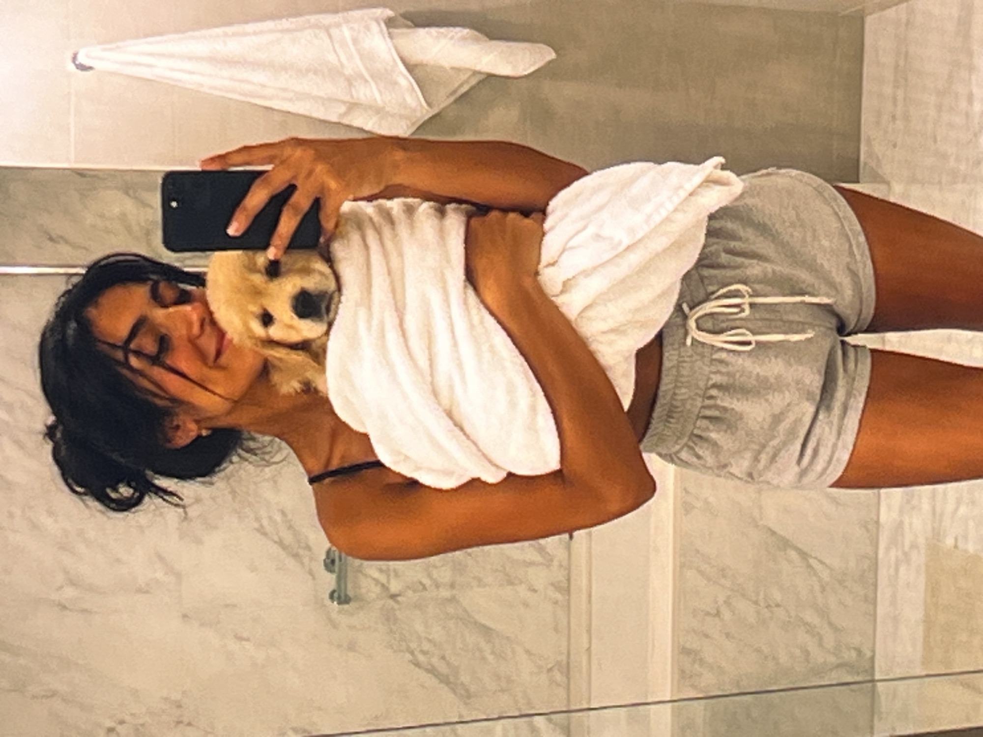 Puppy bath time and cuddles in Athens bathroom