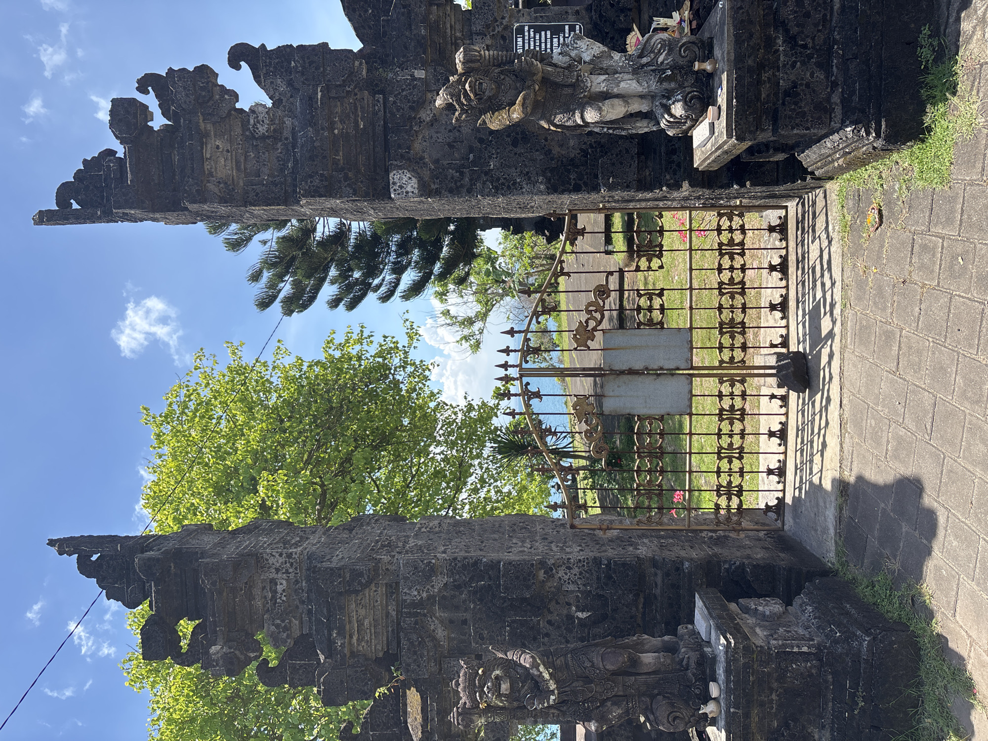Traditional Balinese gates and coastal views documented in Indonesia