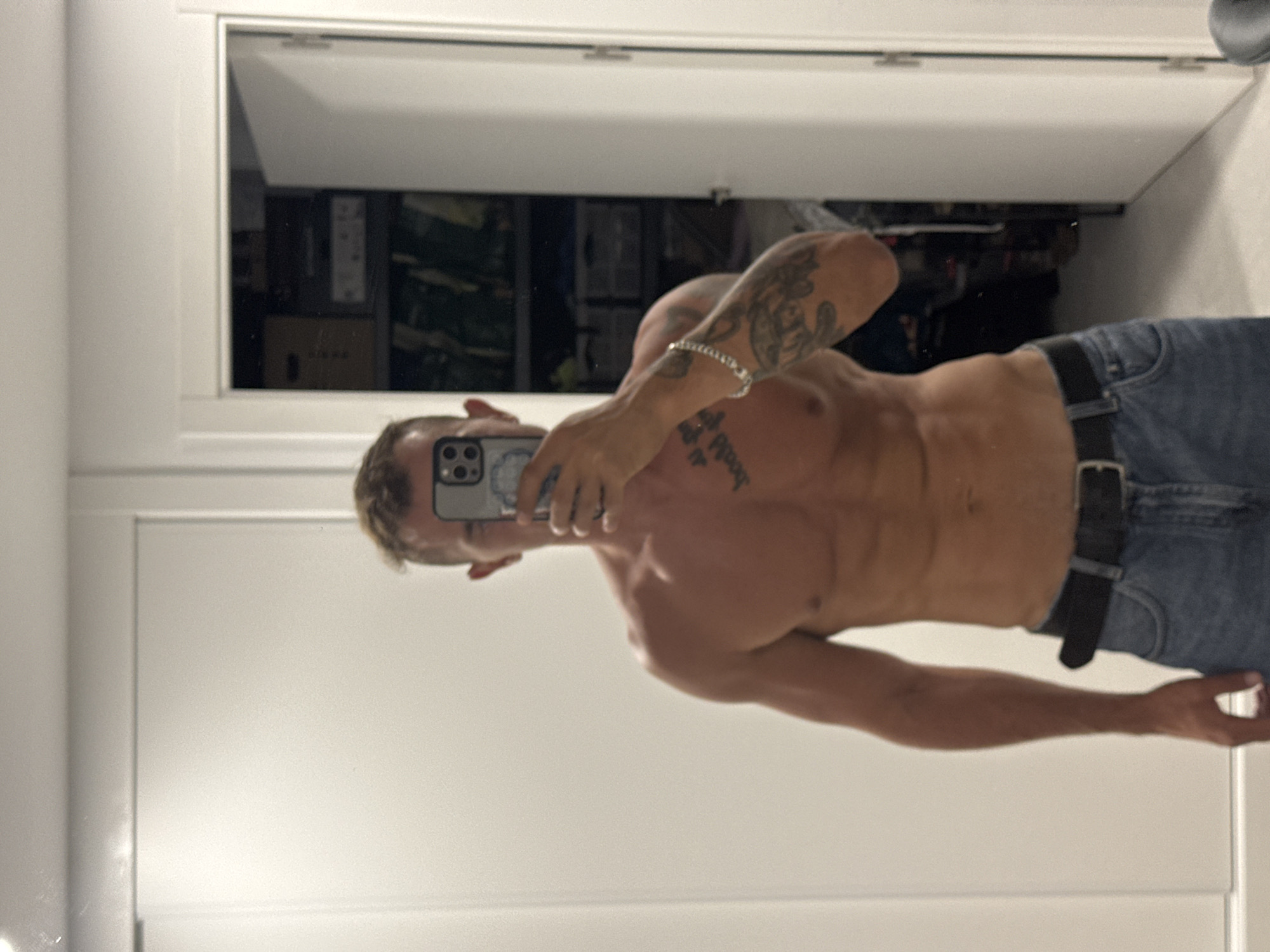 Mirror selfie series in a Finestrat bathroom, June evening