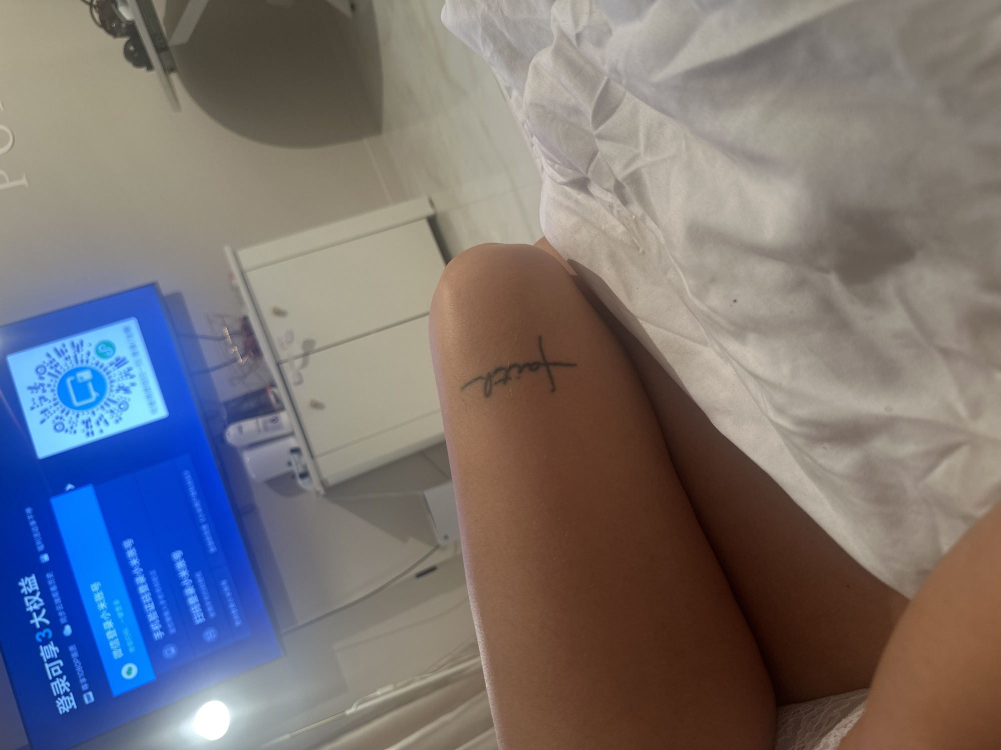 Person photographed resting indoors in Moscow apartment setting