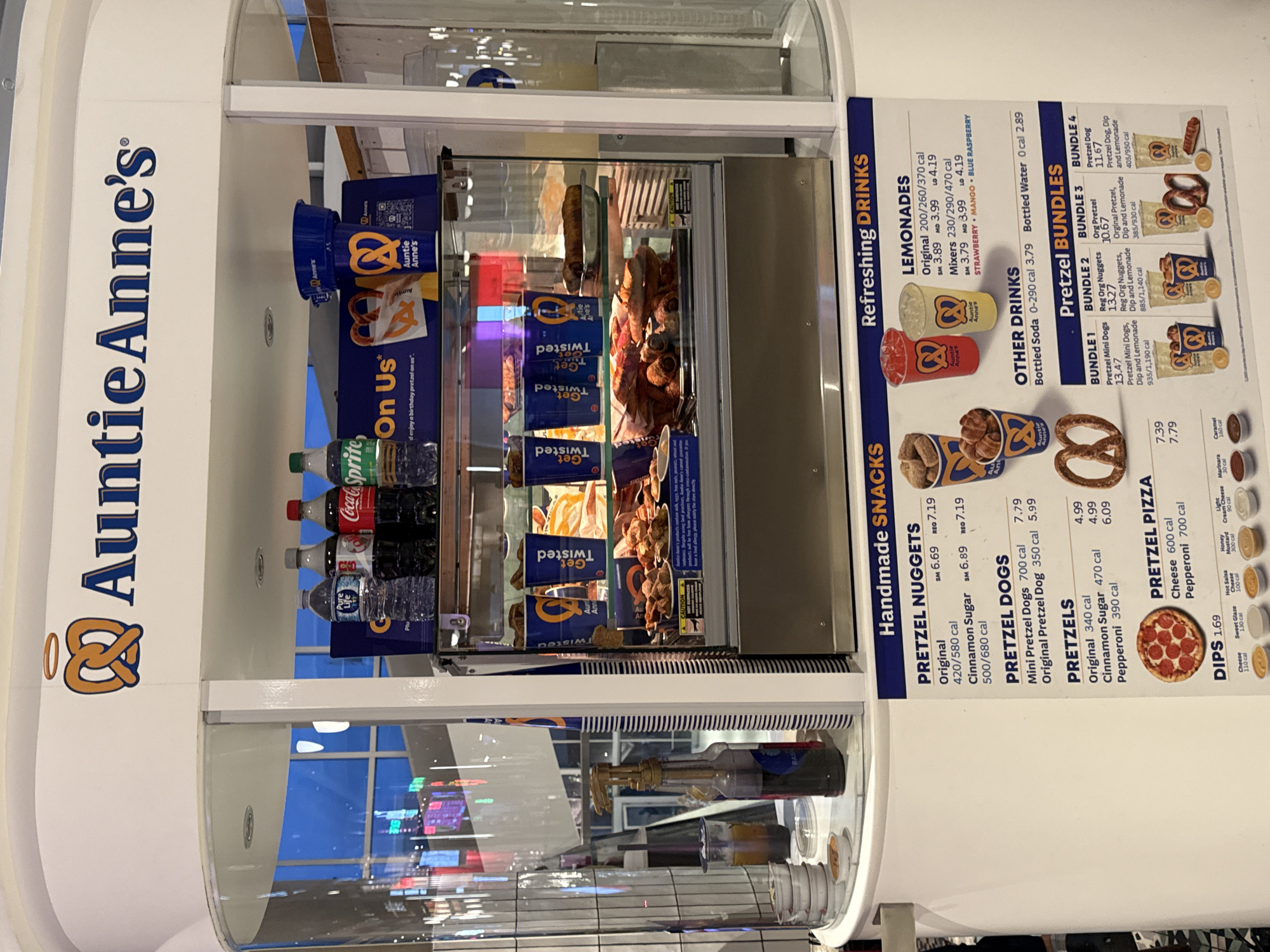 Empty Auntie Anne's pretzel stand observed in mall setting