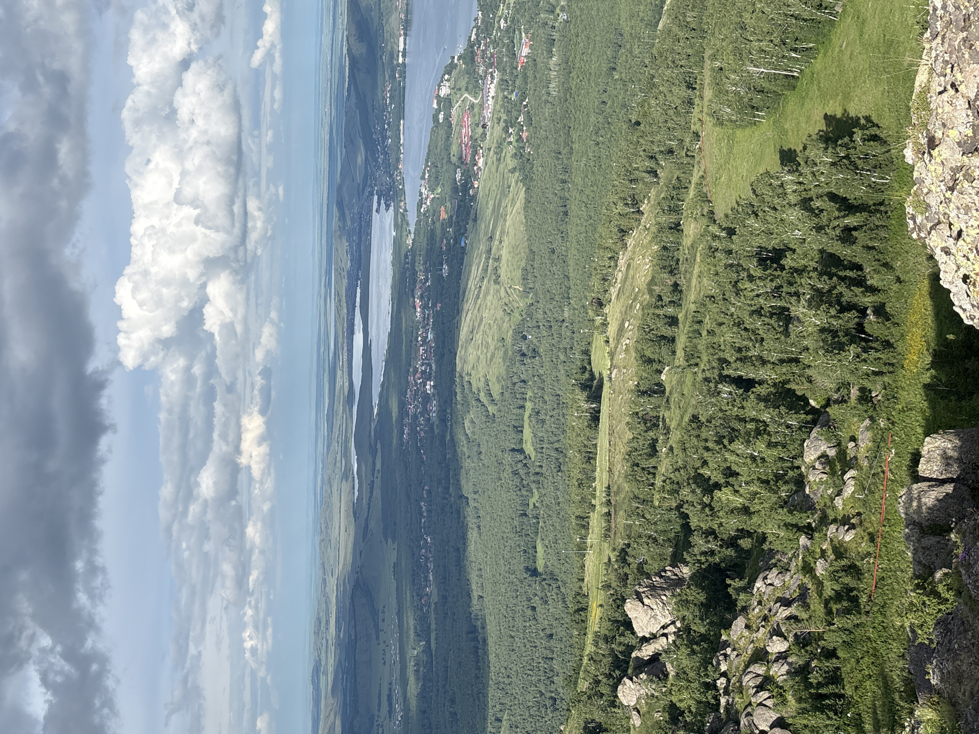 Rocky mountain ridge walk with sweeping lake and valley views