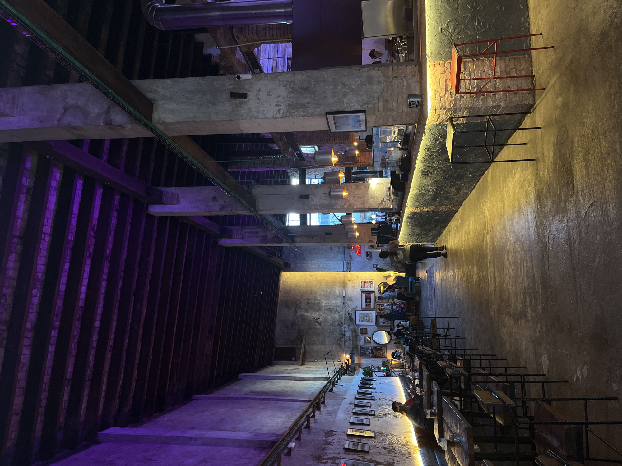 Bar interior with purple lighting documented in Torrent