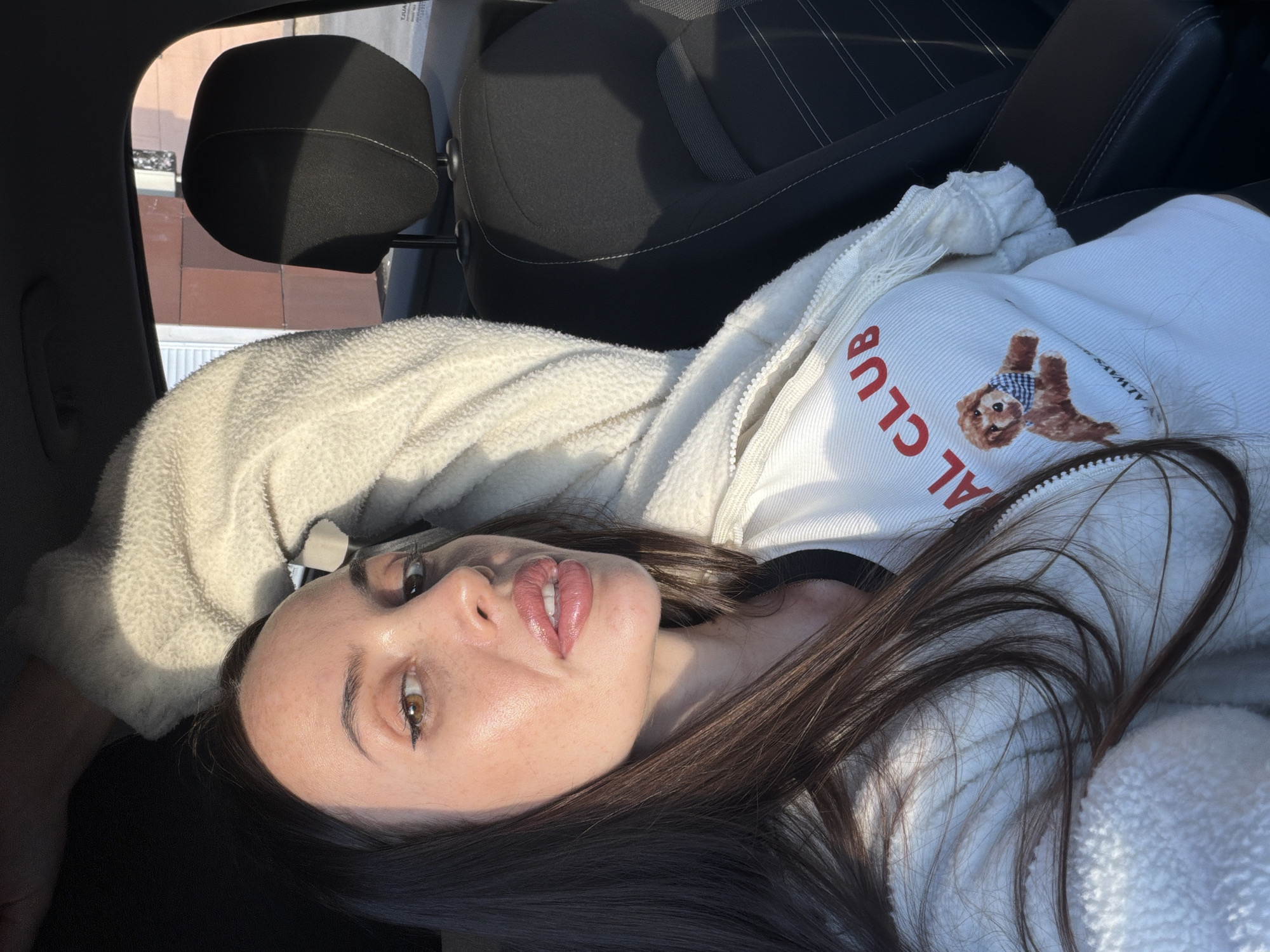 Lazy afternoon moments inside a sunlit car in Saint Petersburg