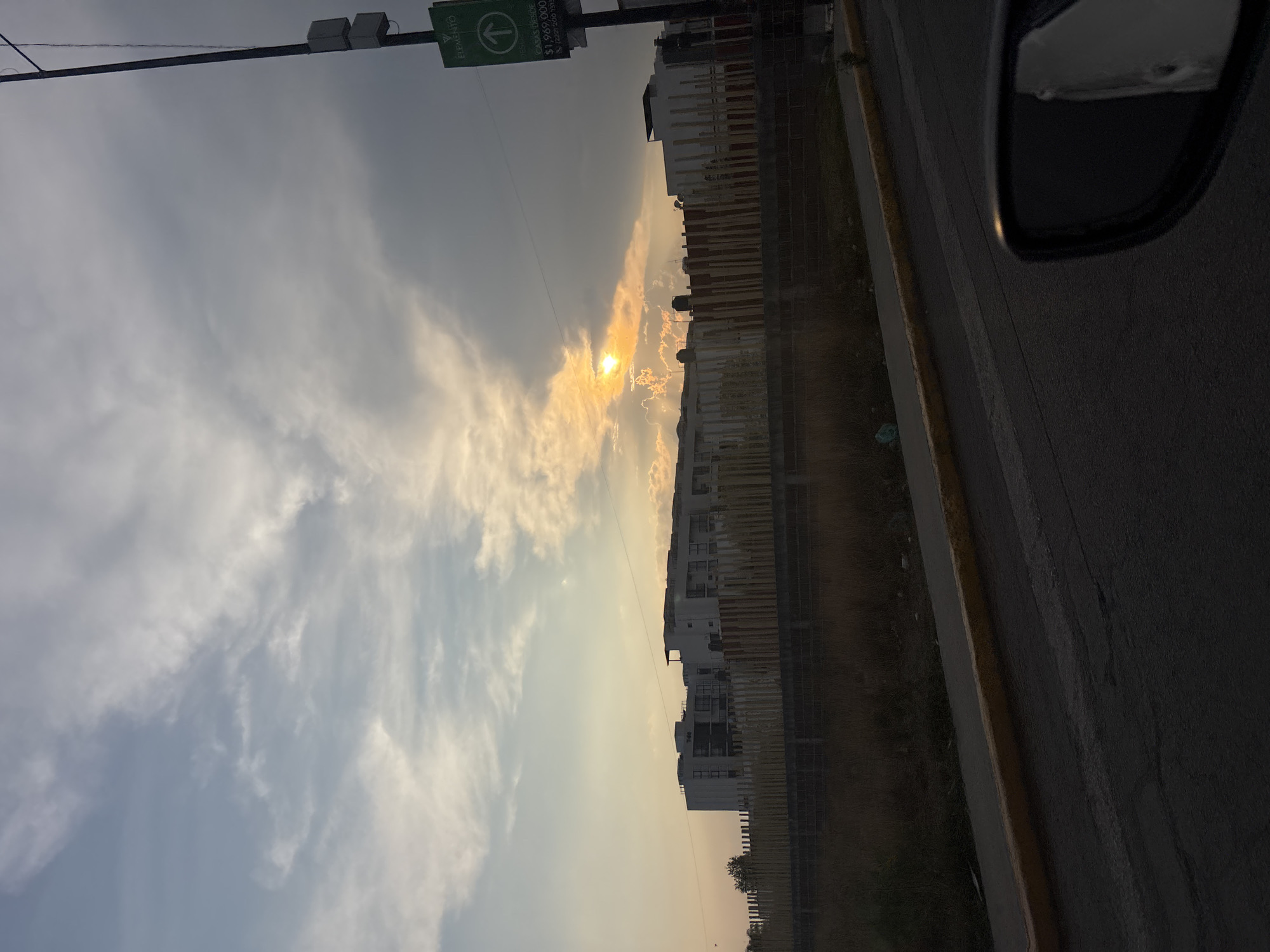 Nighttime roadside moment captured from vehicle in Puebla, Mexico
