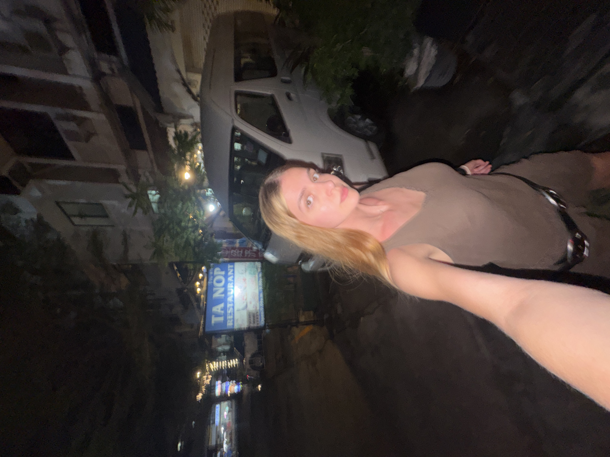 Woman takes bathroom selfie in Patong, Thailand