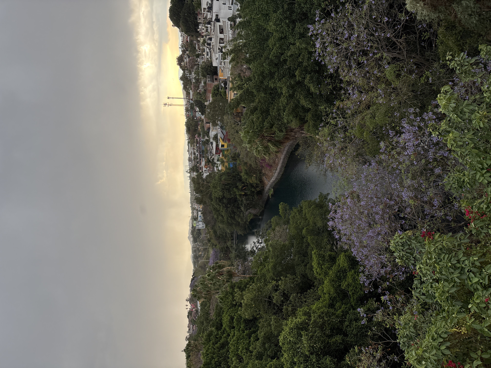 Evening drone photography session near urban lake in Cuernavaca