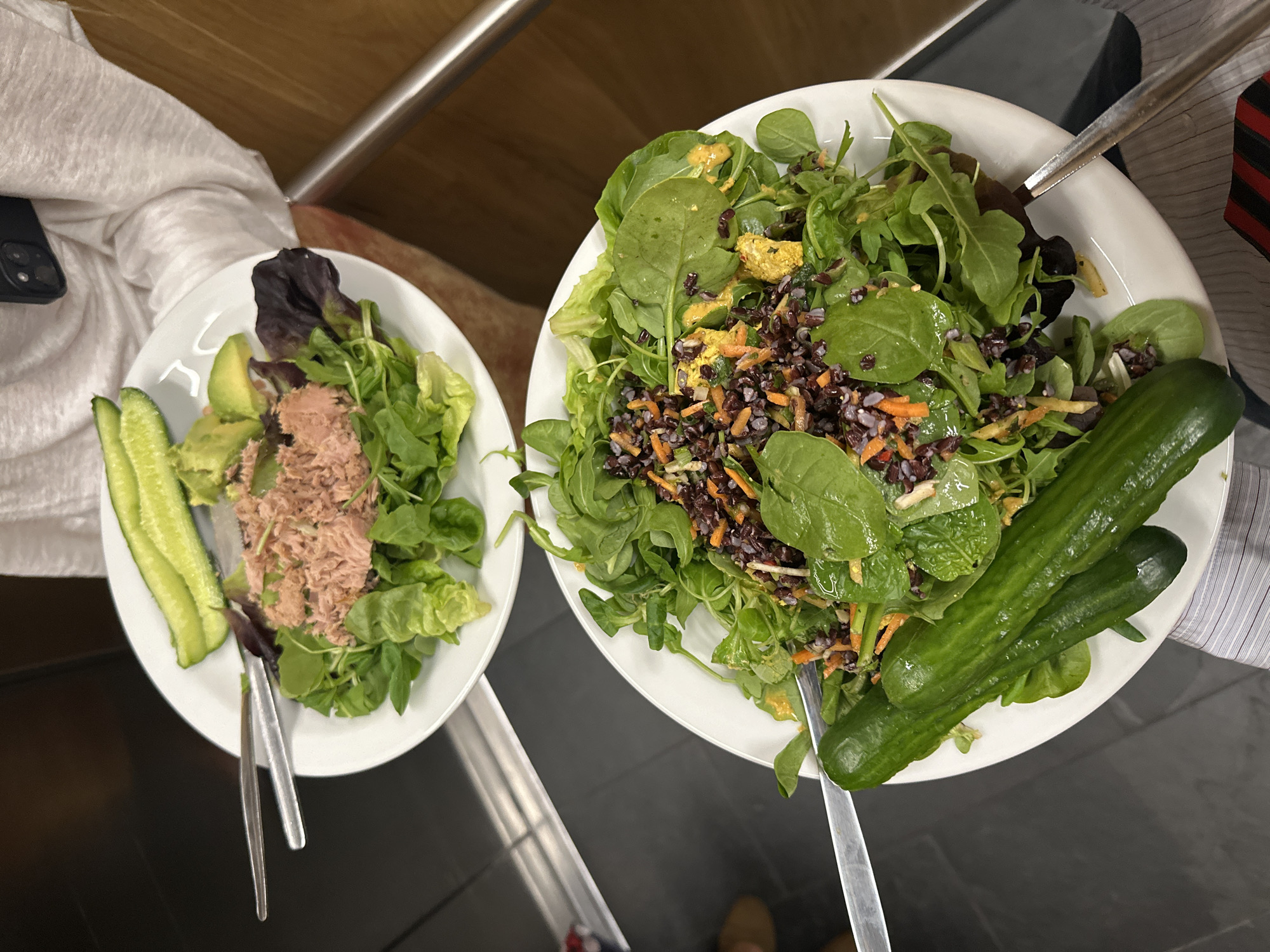 Lunch scene captured in London with salads and juice