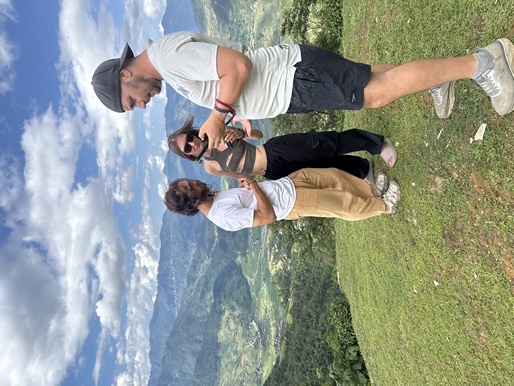 Tourists gather on Tu Le hilltops for mountain views