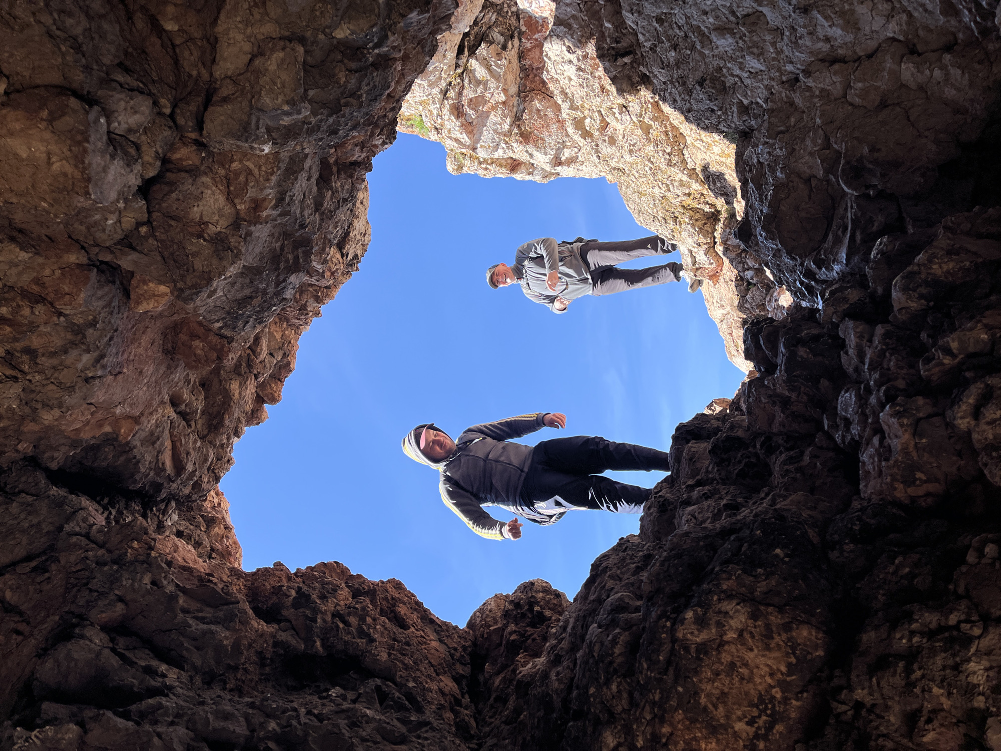 Hikers explore rocky cave formation in Krasnoyarsk, Russia