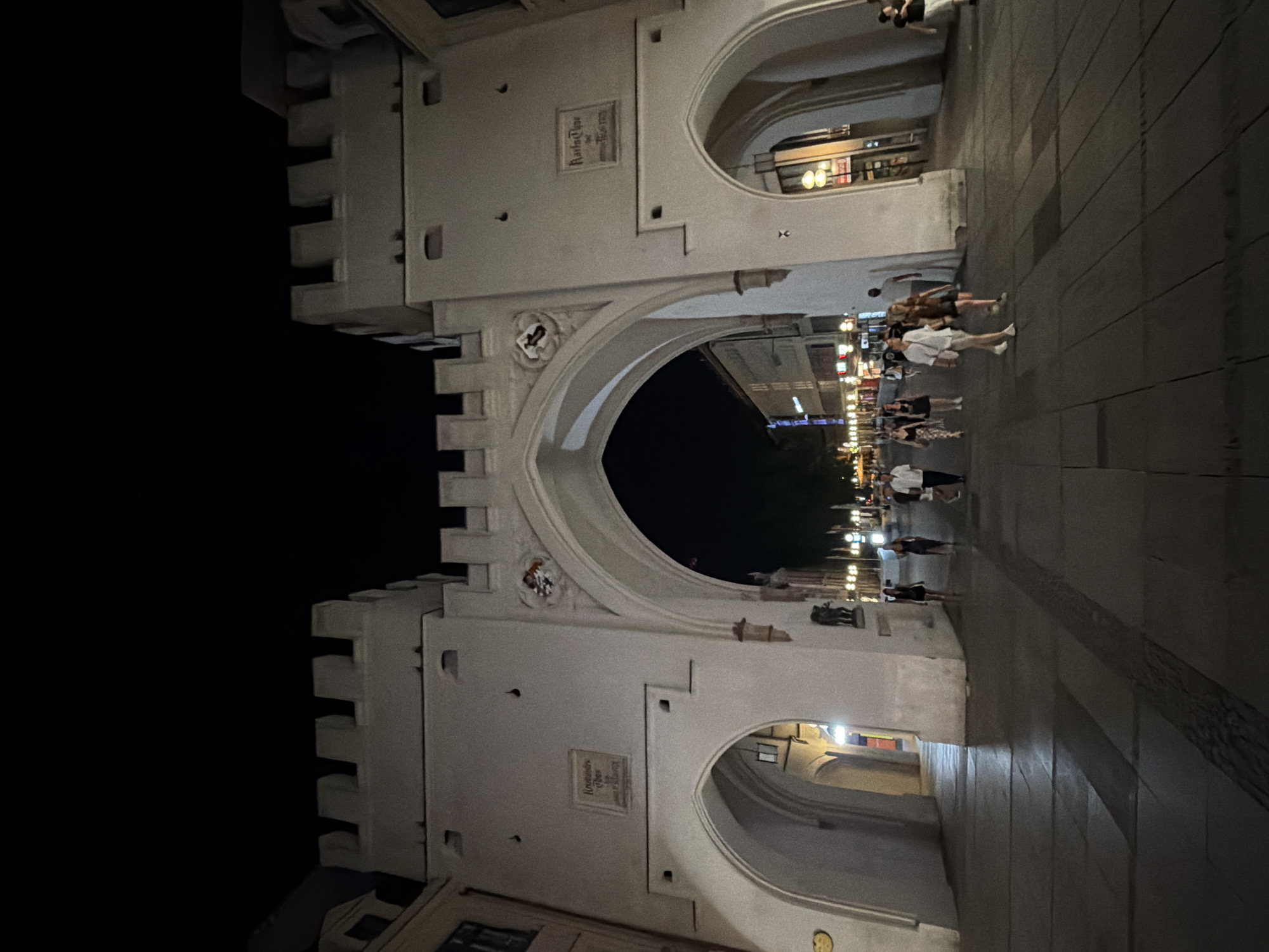 Munich's Karlstor and Michaelskirche illuminated at night