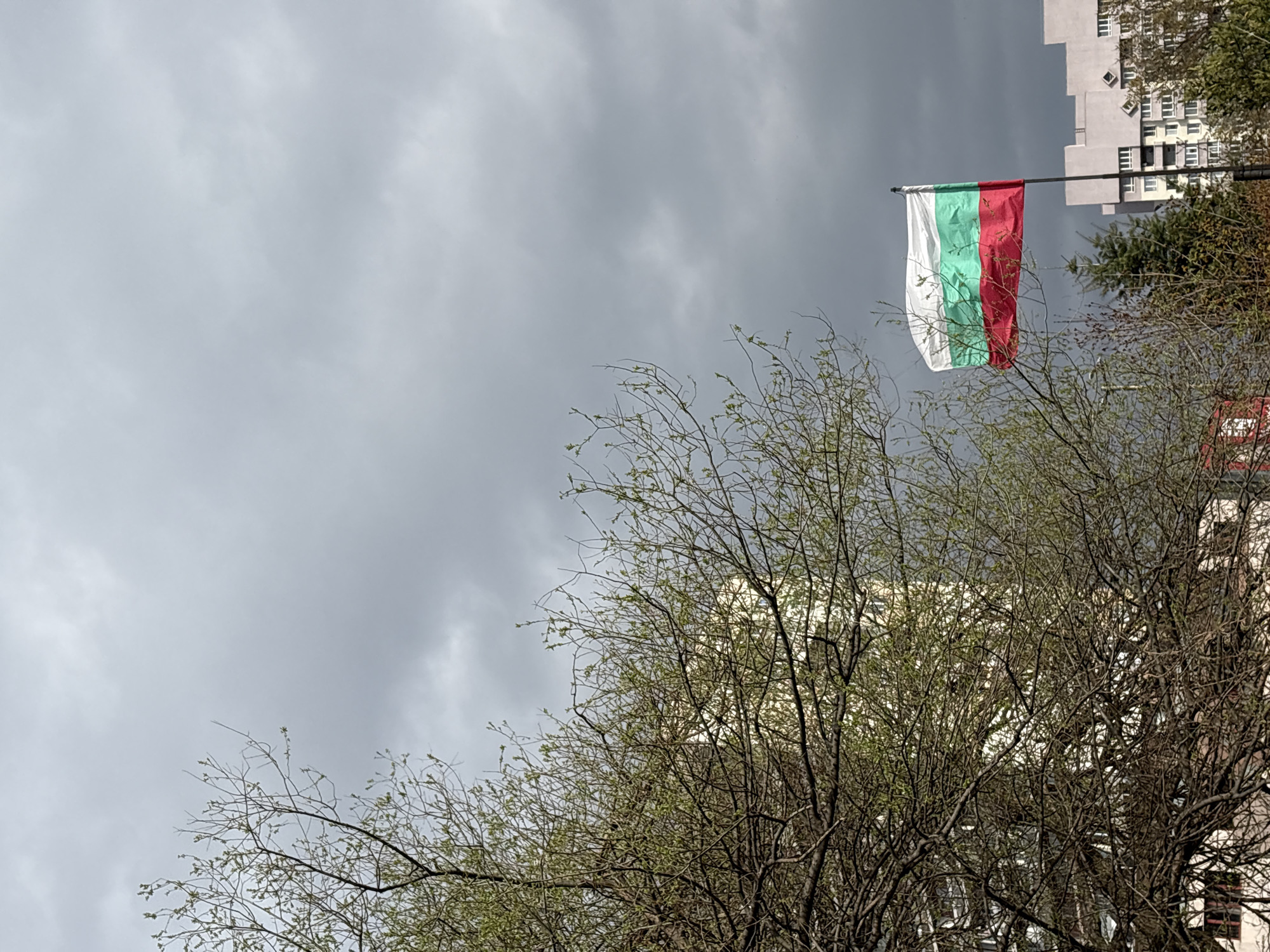 Bulgarian flag flies over Sofia on overcast spring morning