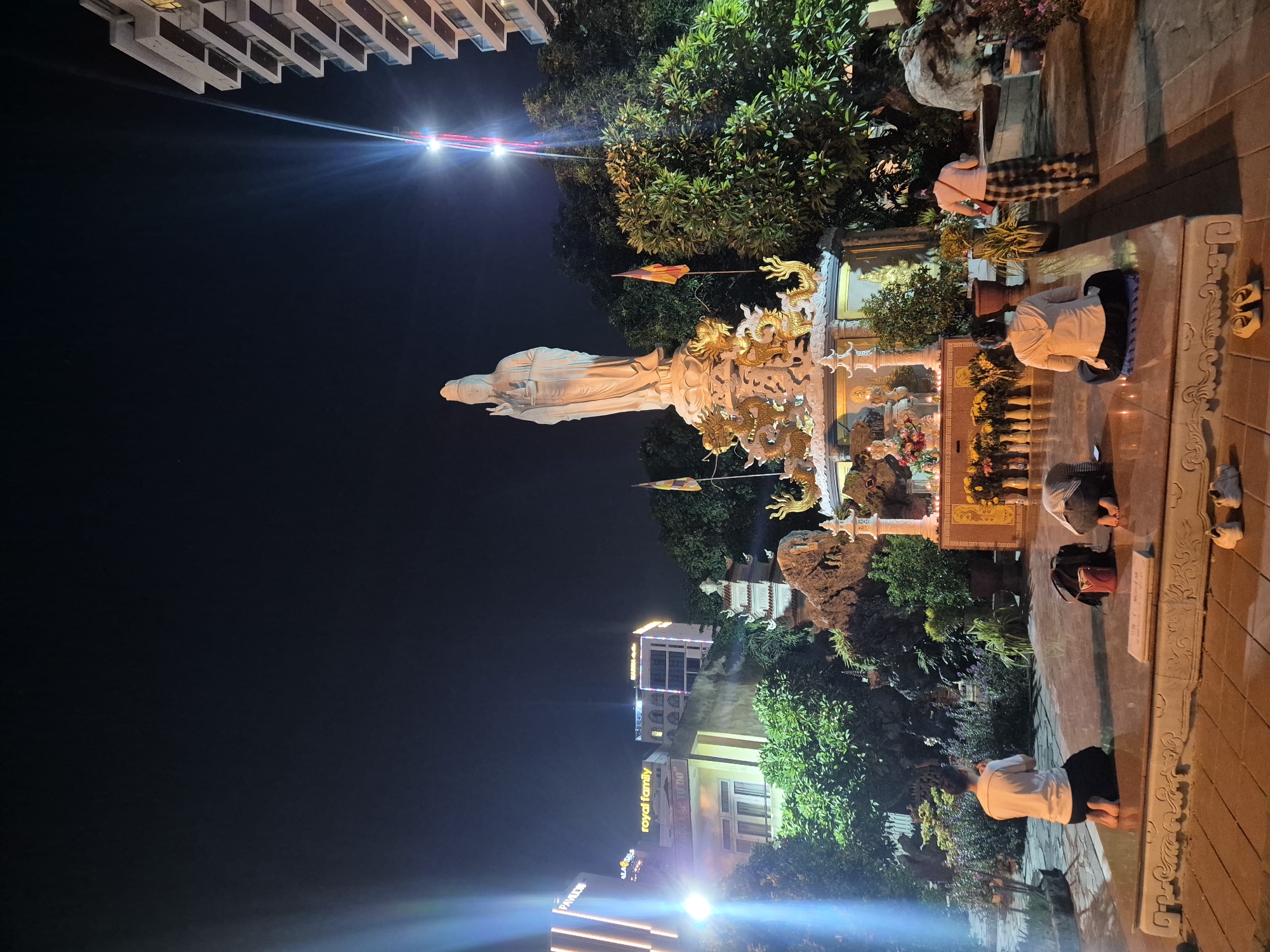 Nighttime at Linh Ứng Temple — dancing, conical hats, Đà Nẵng
