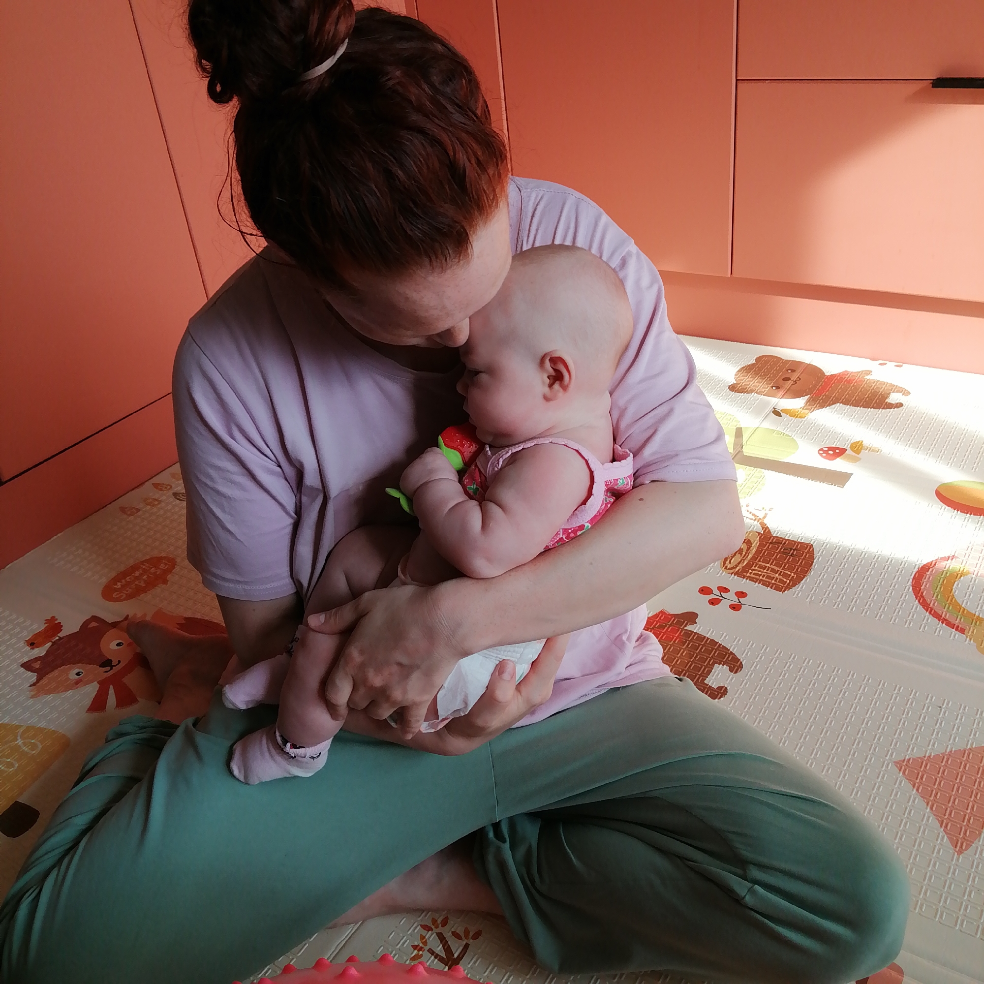 Family playtime captured in Russian home during afternoon