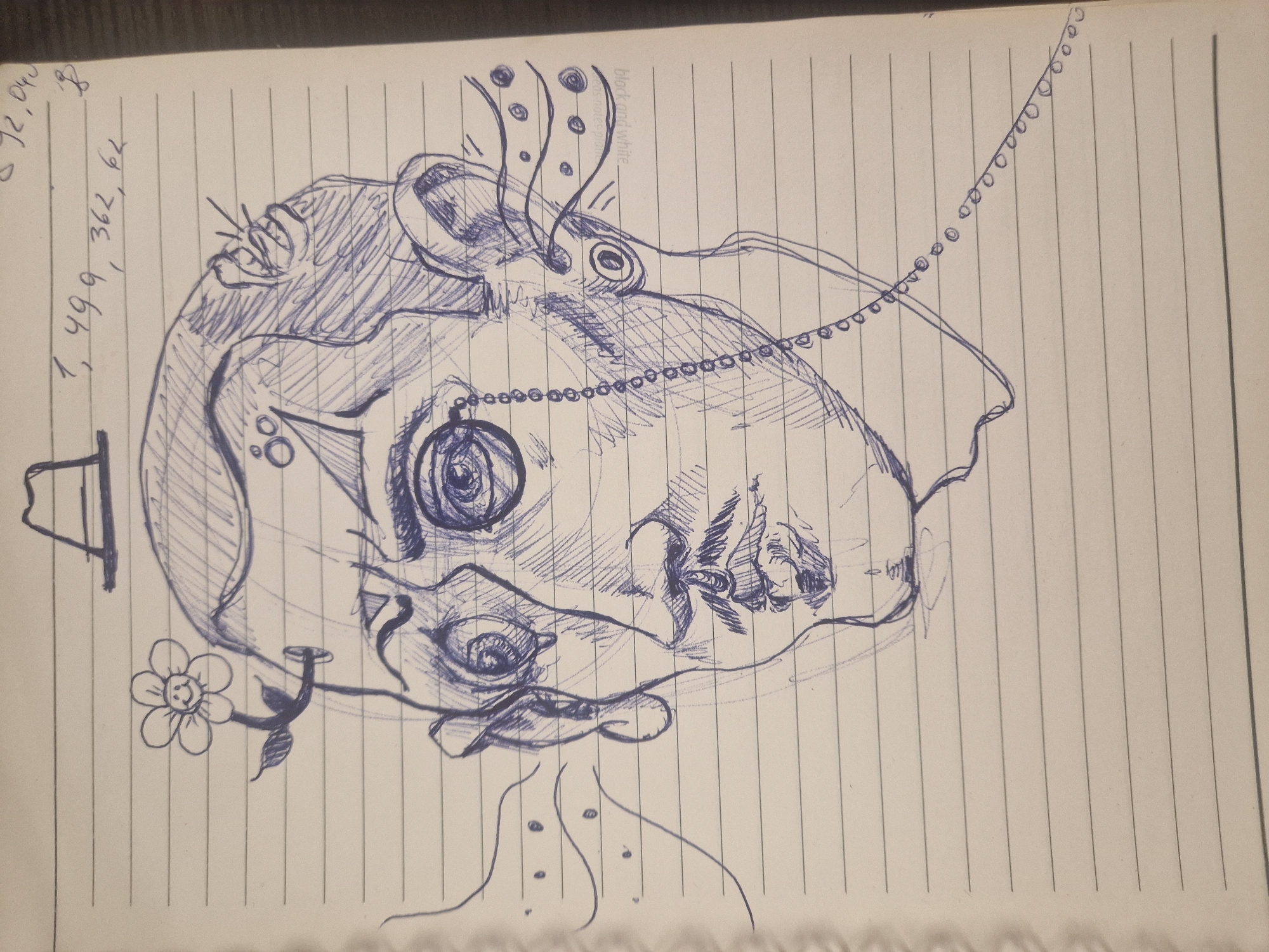 Abstract blue pen drawing created on notebook paper
