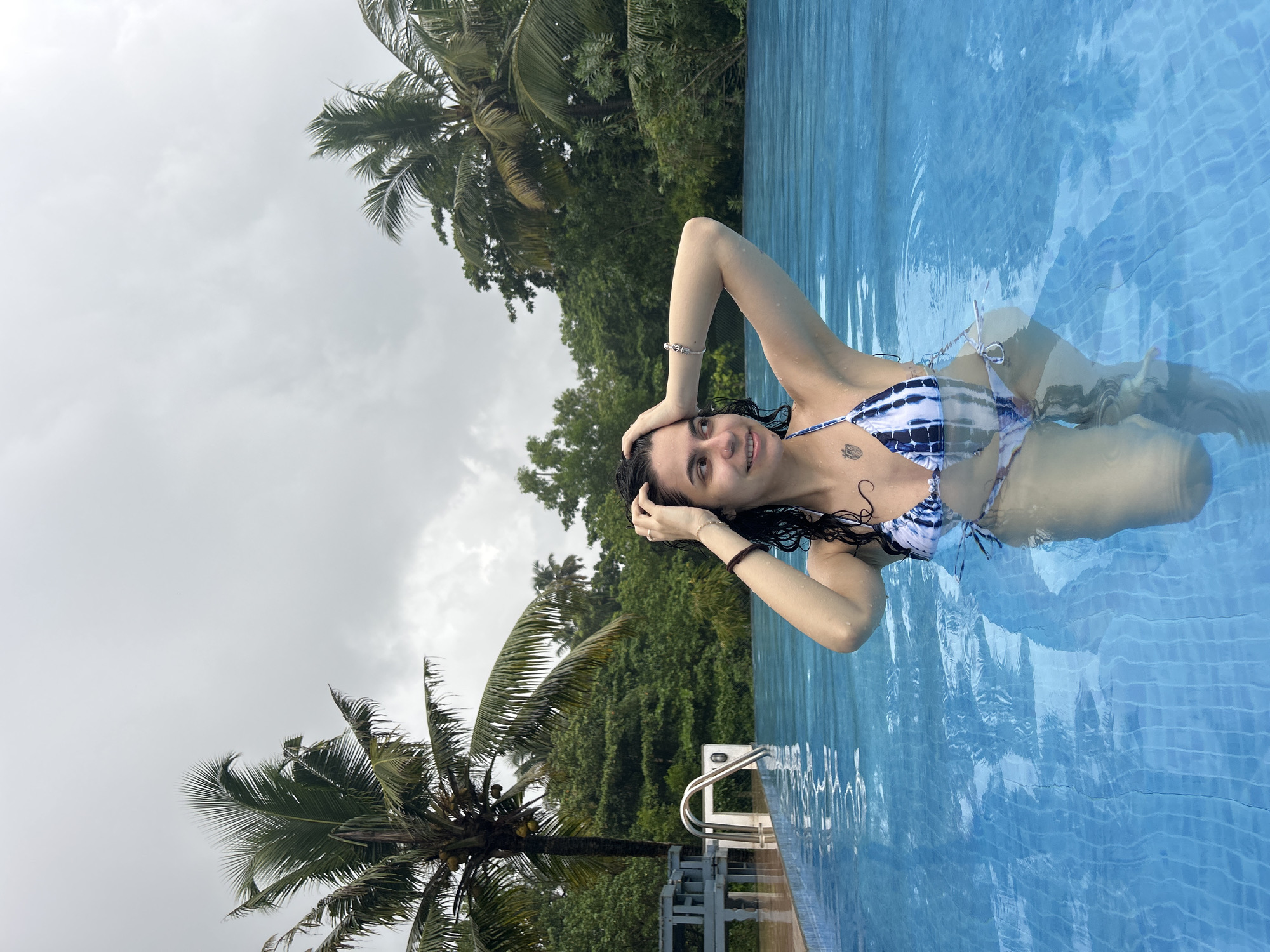 Woman enjoys leisurely swim in Alappuzha pool
