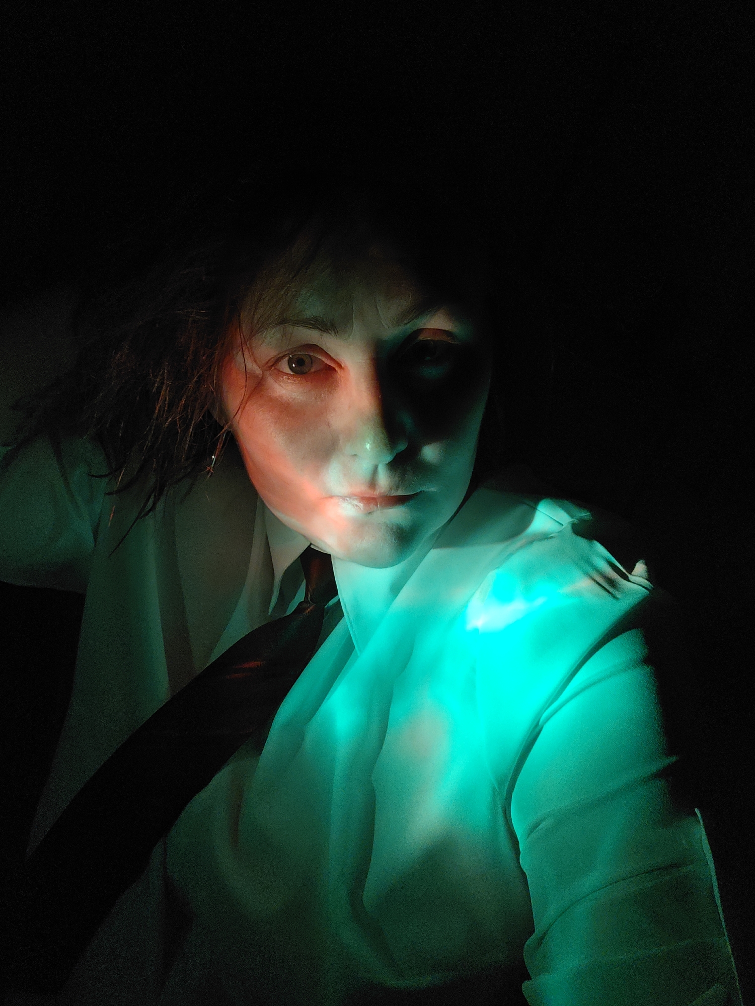 Dramatic portraits captured under colored lighting in Markovskii, Russia