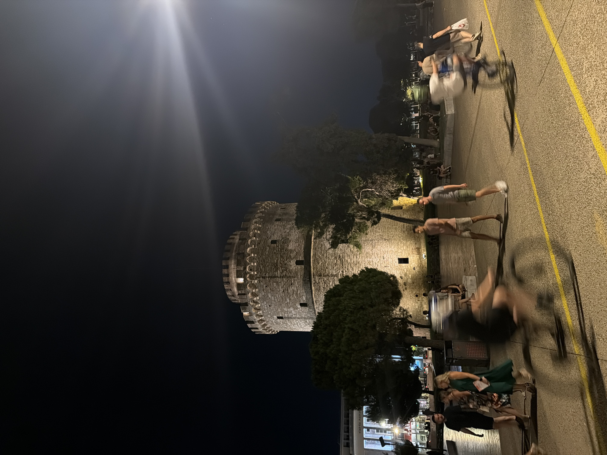 Thessaloniki's White Tower glowing after dark