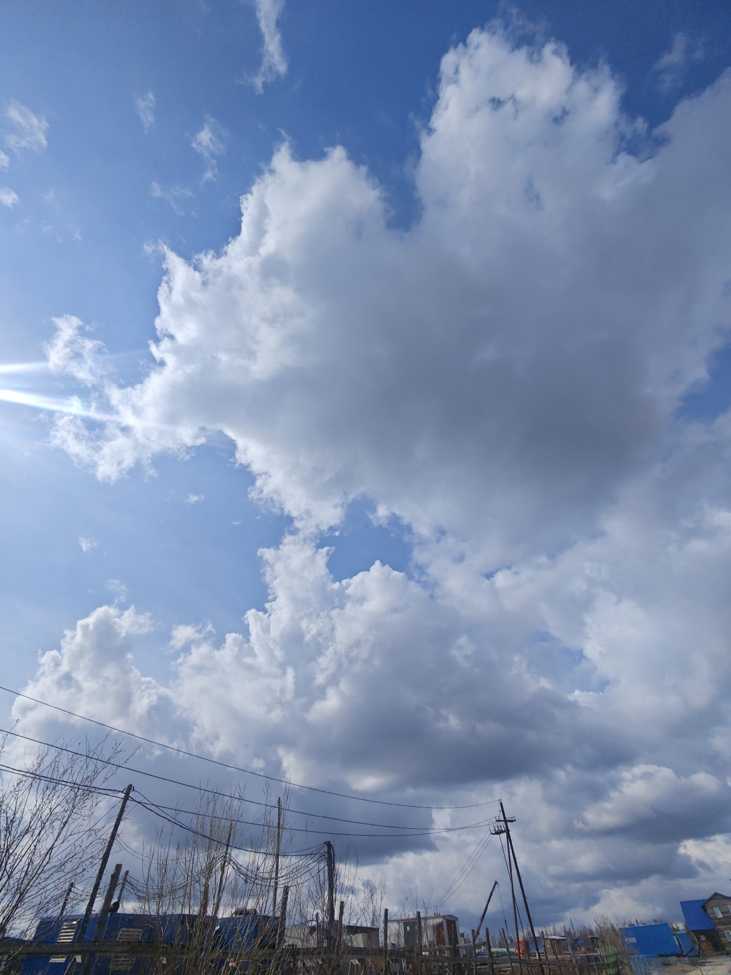 Cloudy skies and urban development observed in Russian city