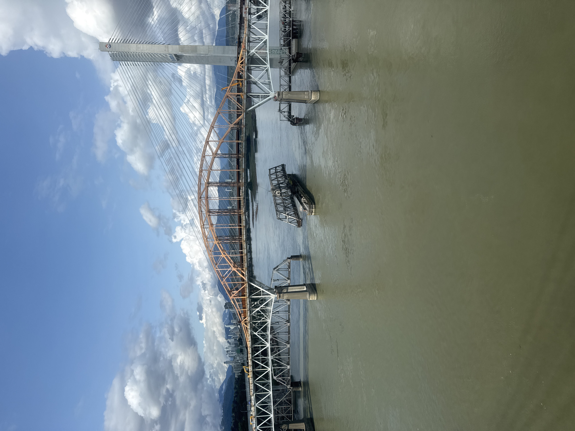 Fraser River's muddy waters and bridge crossings, Surrey BC