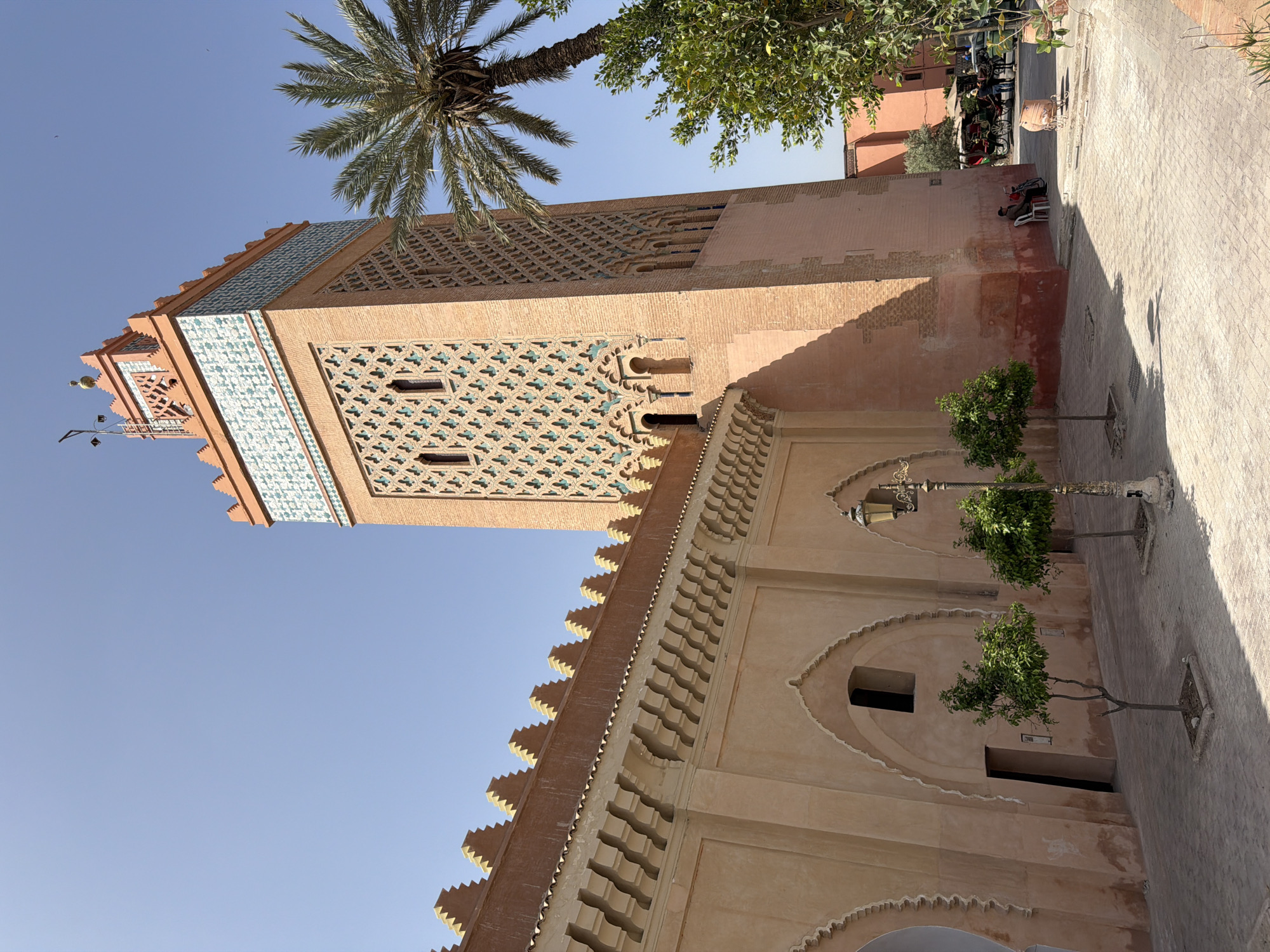 Tourist documents historic Mechouar Kasbah architecture in Morocco