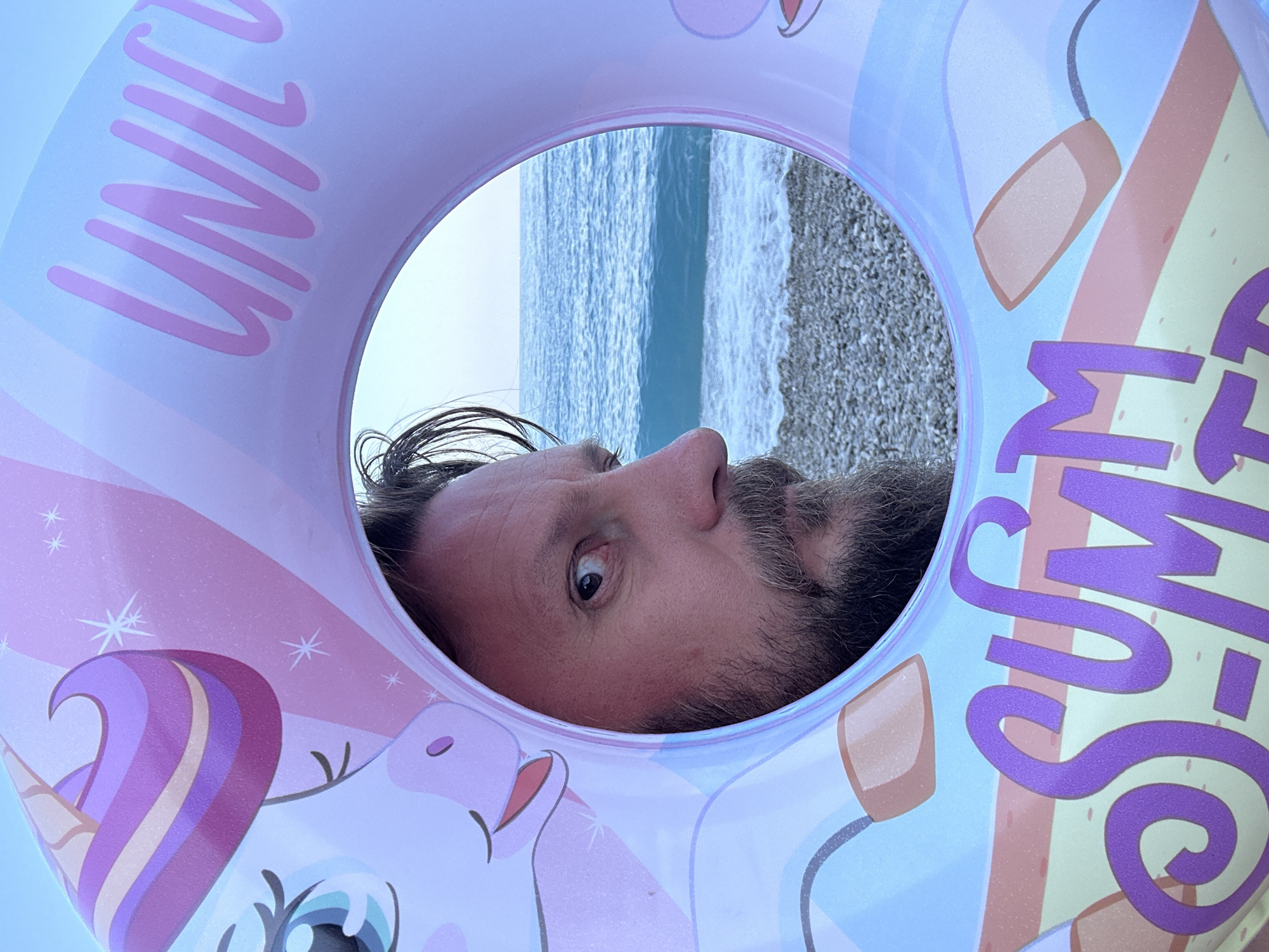 Lazy morning at a Fethiye beach with inflatables and selfies