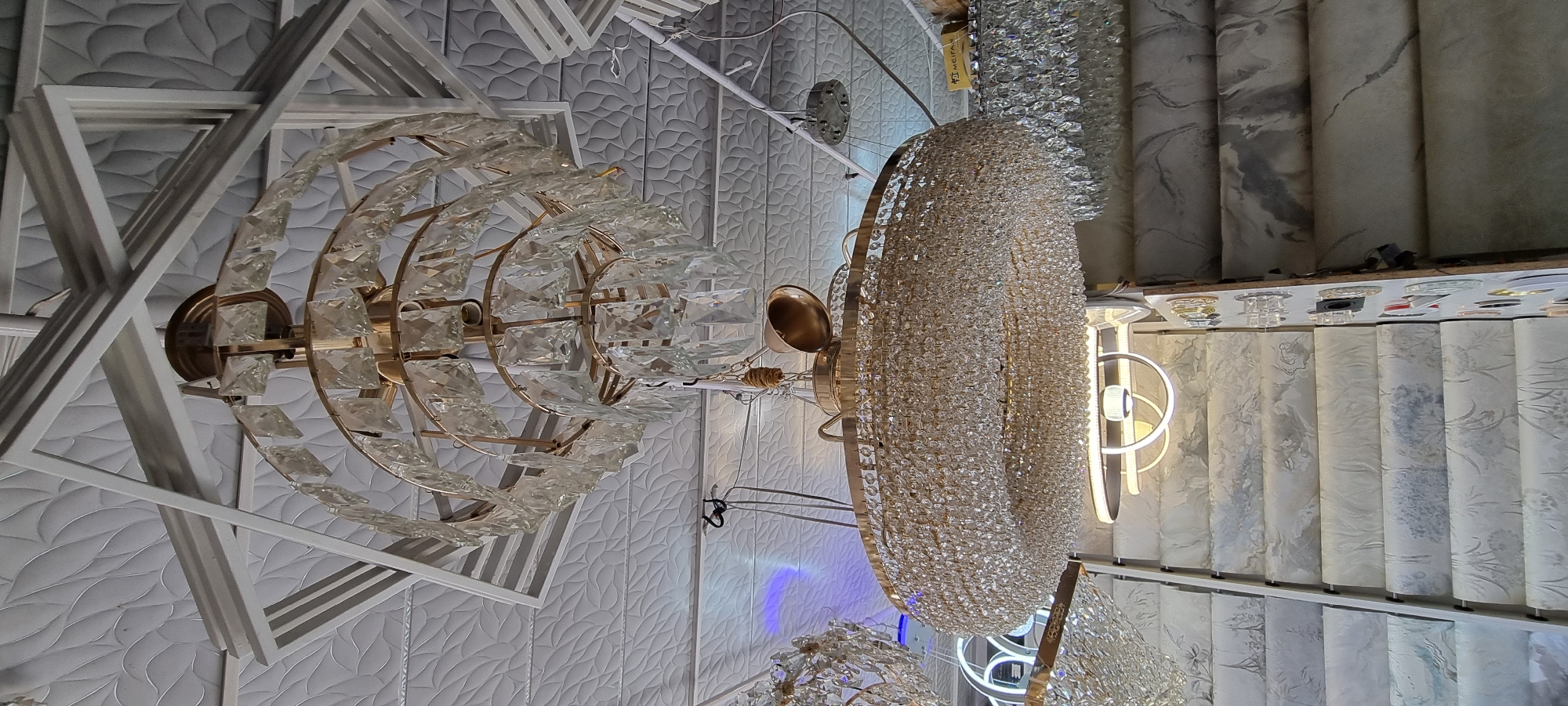 Inside a Bokhtar home decor shop stocked with chandeliers and wallpaper