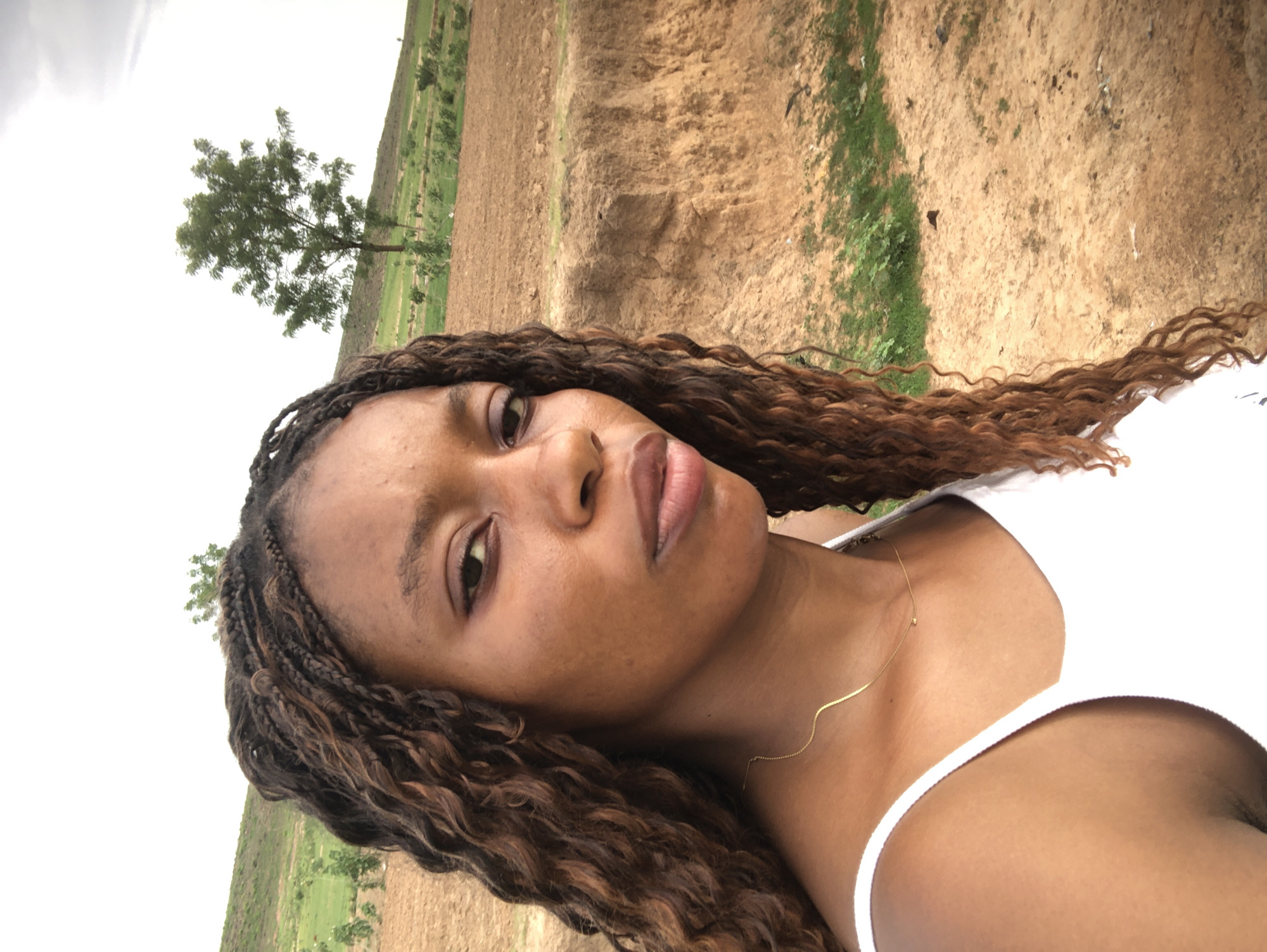 Woman photographed in rural Kashere, Nigeria countryside setting