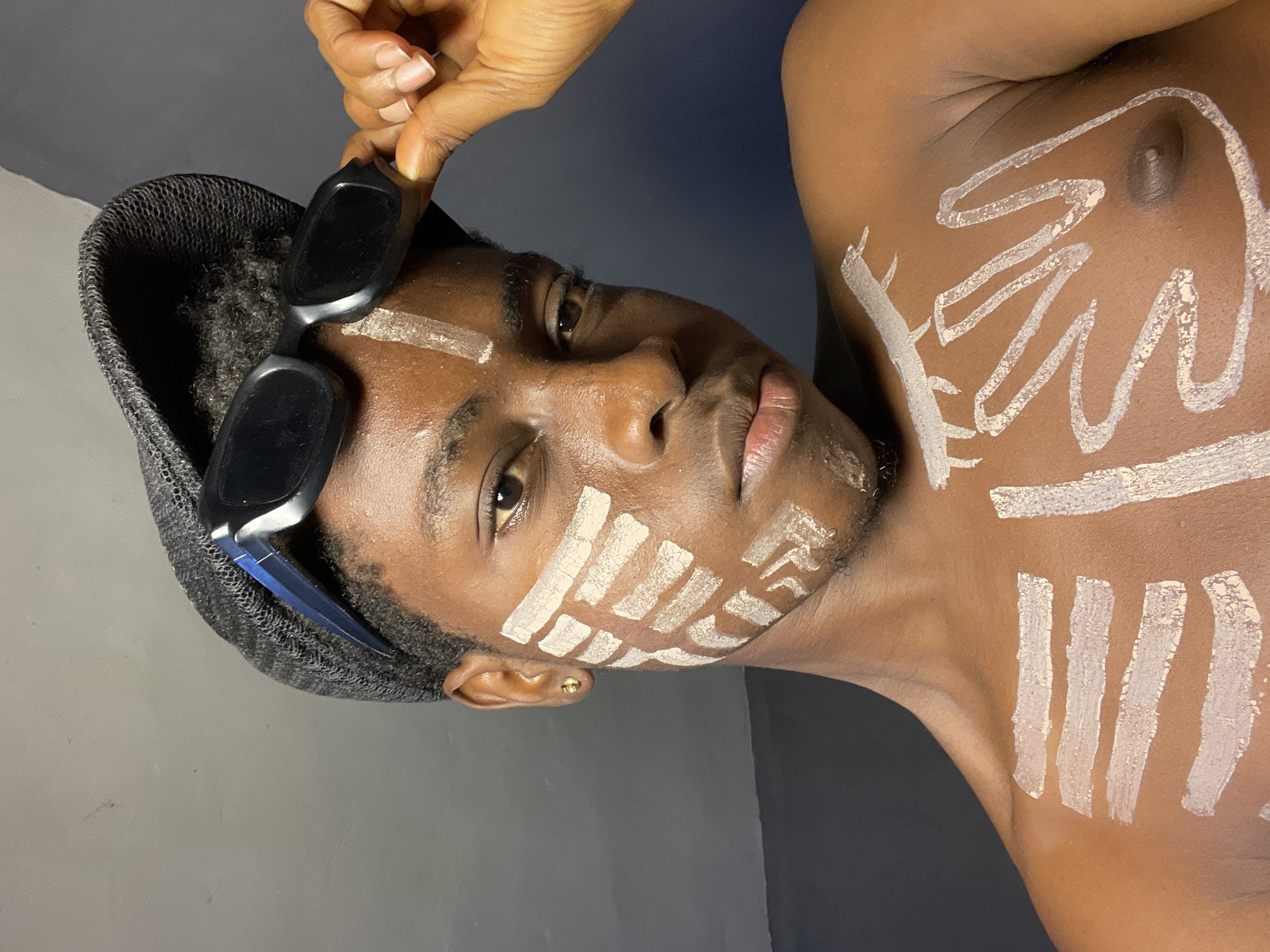 Traditional body paint portrait documented in Nkpor, Nigeria