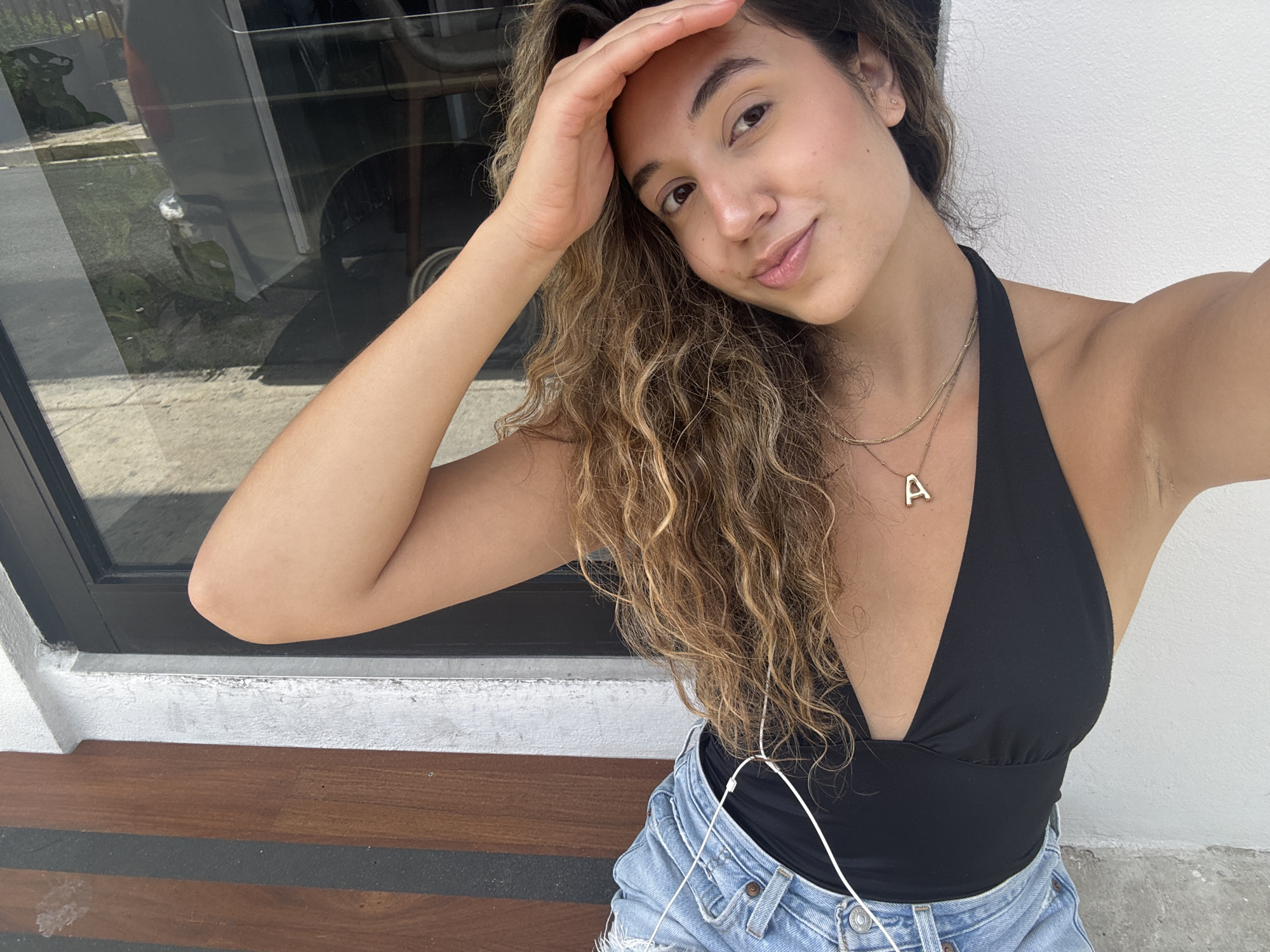 Indoor-to-outdoor portrait session in San Juan, same outfit