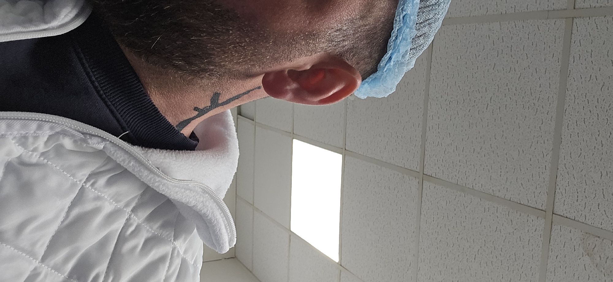 Medical worker photographed in surgical attire in Delbrück