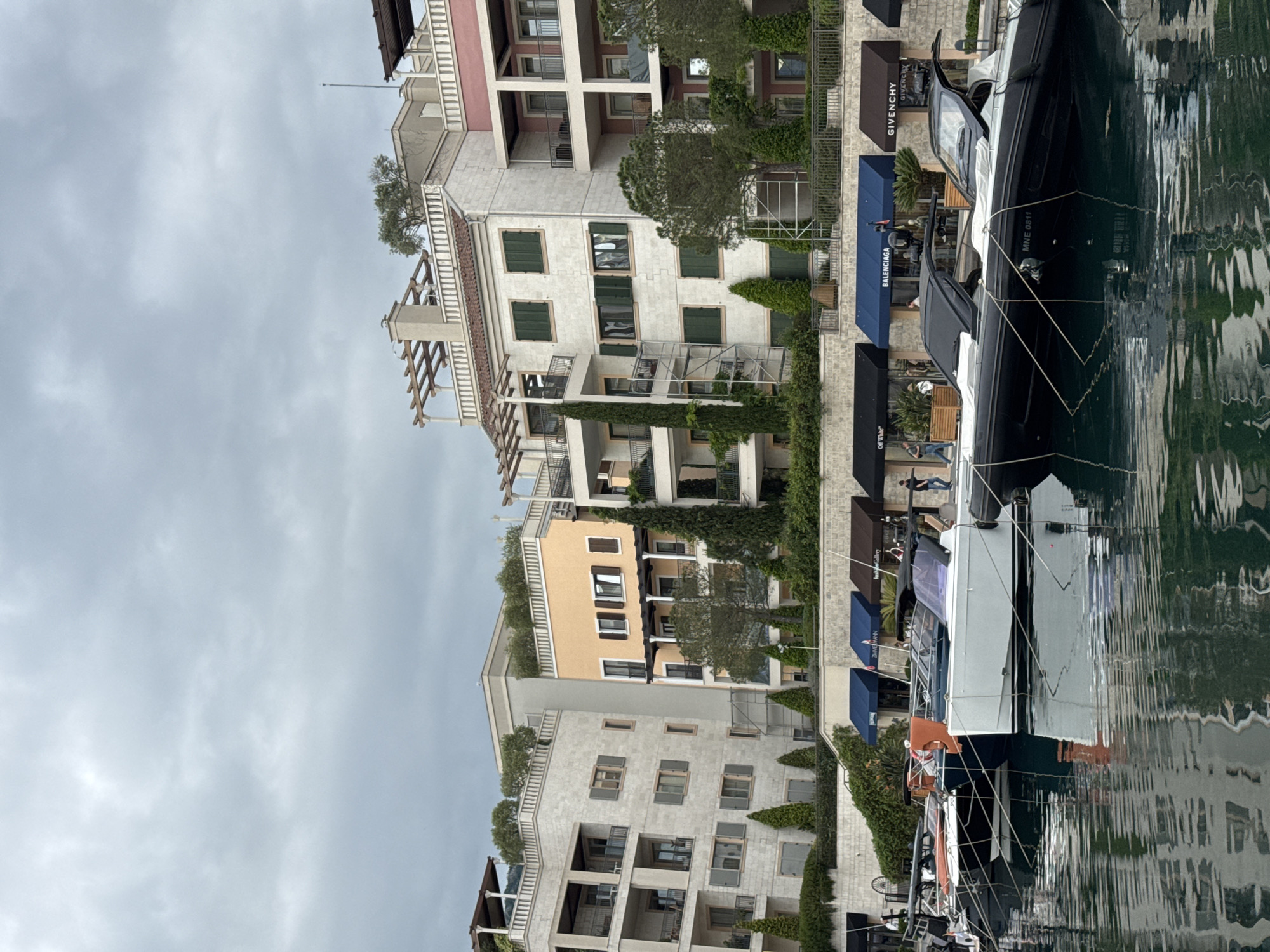 Tivat waterfront luxury shopping and local café documented simultaneously
