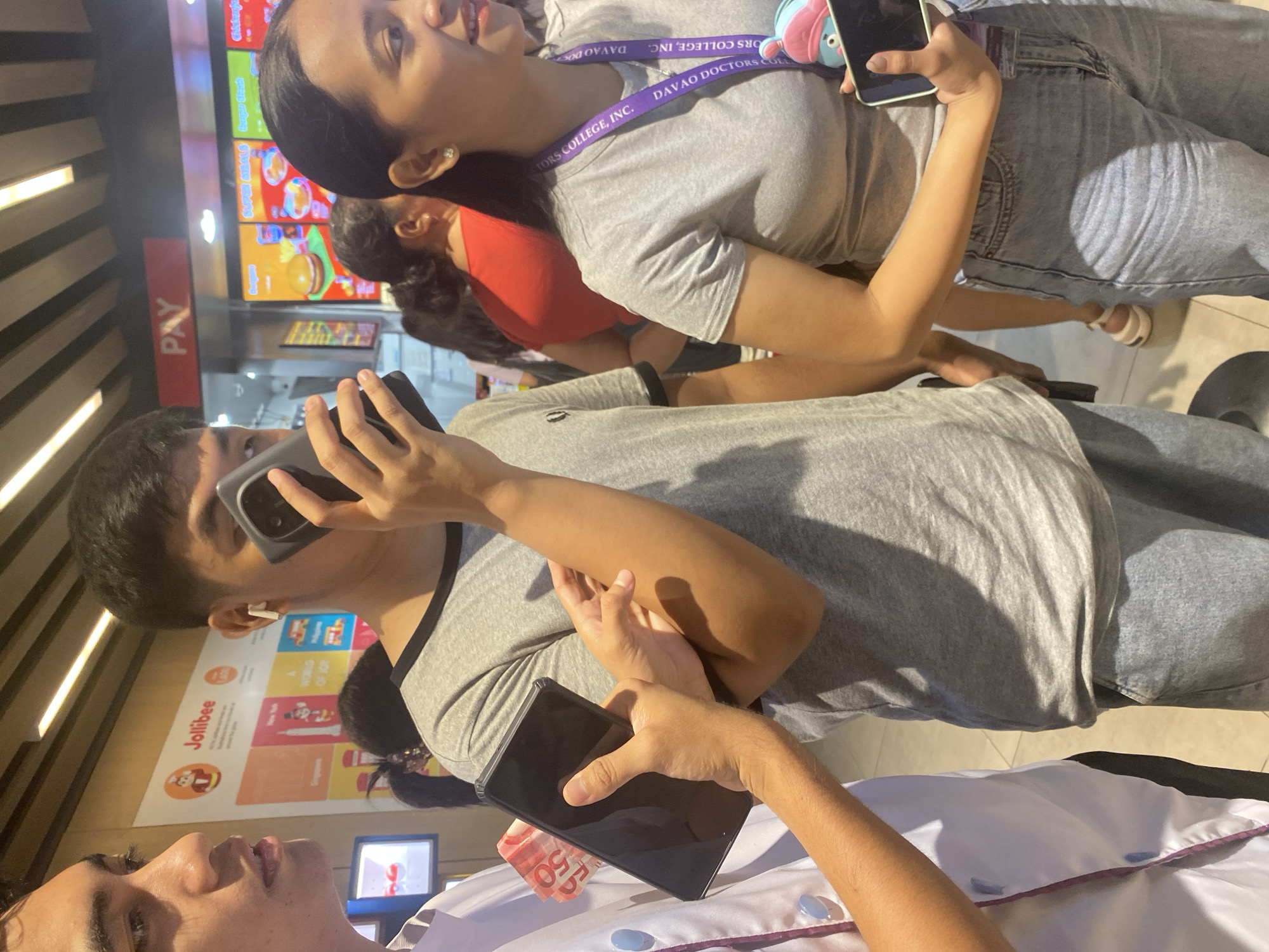 Group selfie moment at a Davao City Jollibee