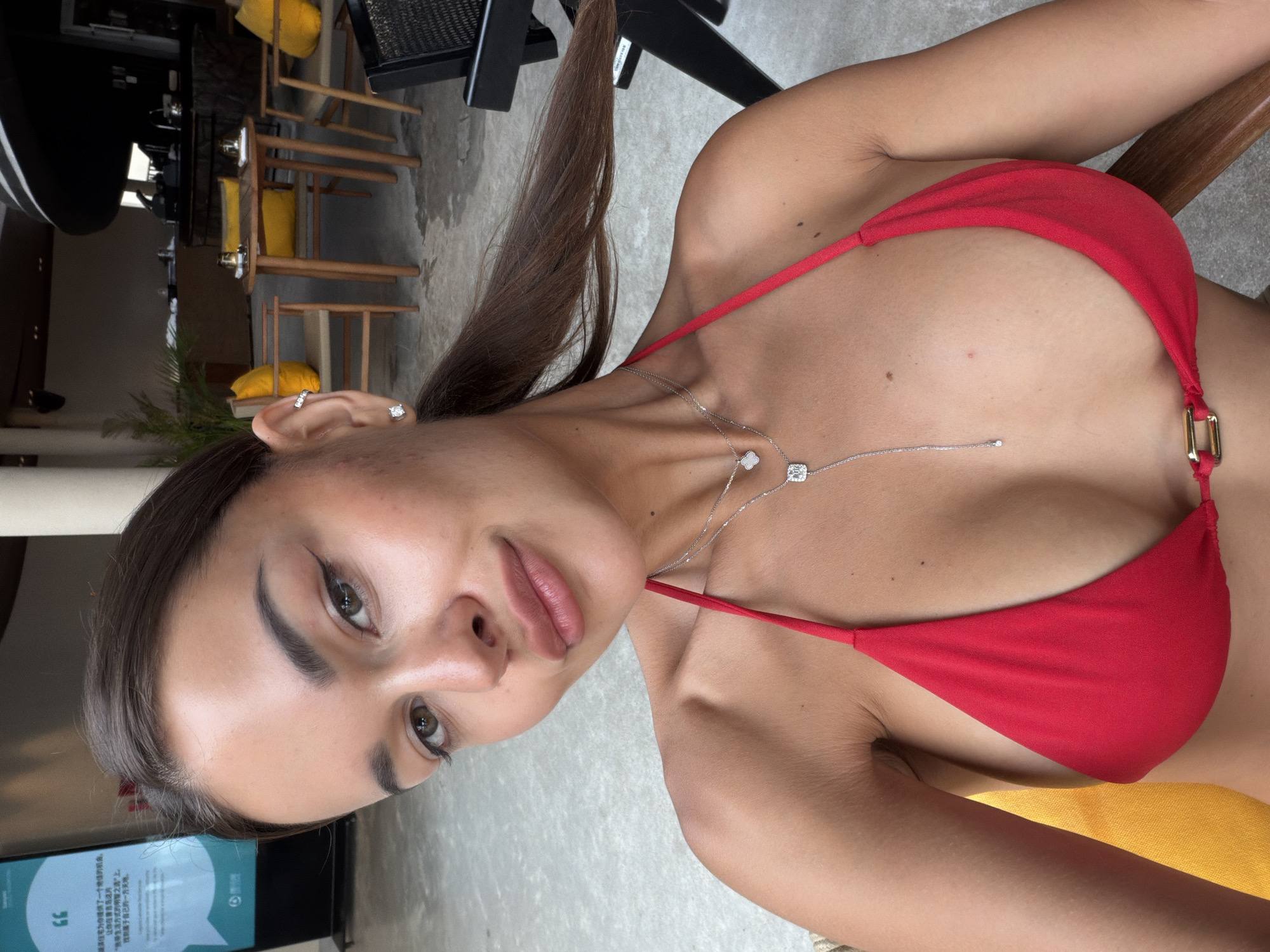 Woman takes selfies in red bikini in Choeng Thale
