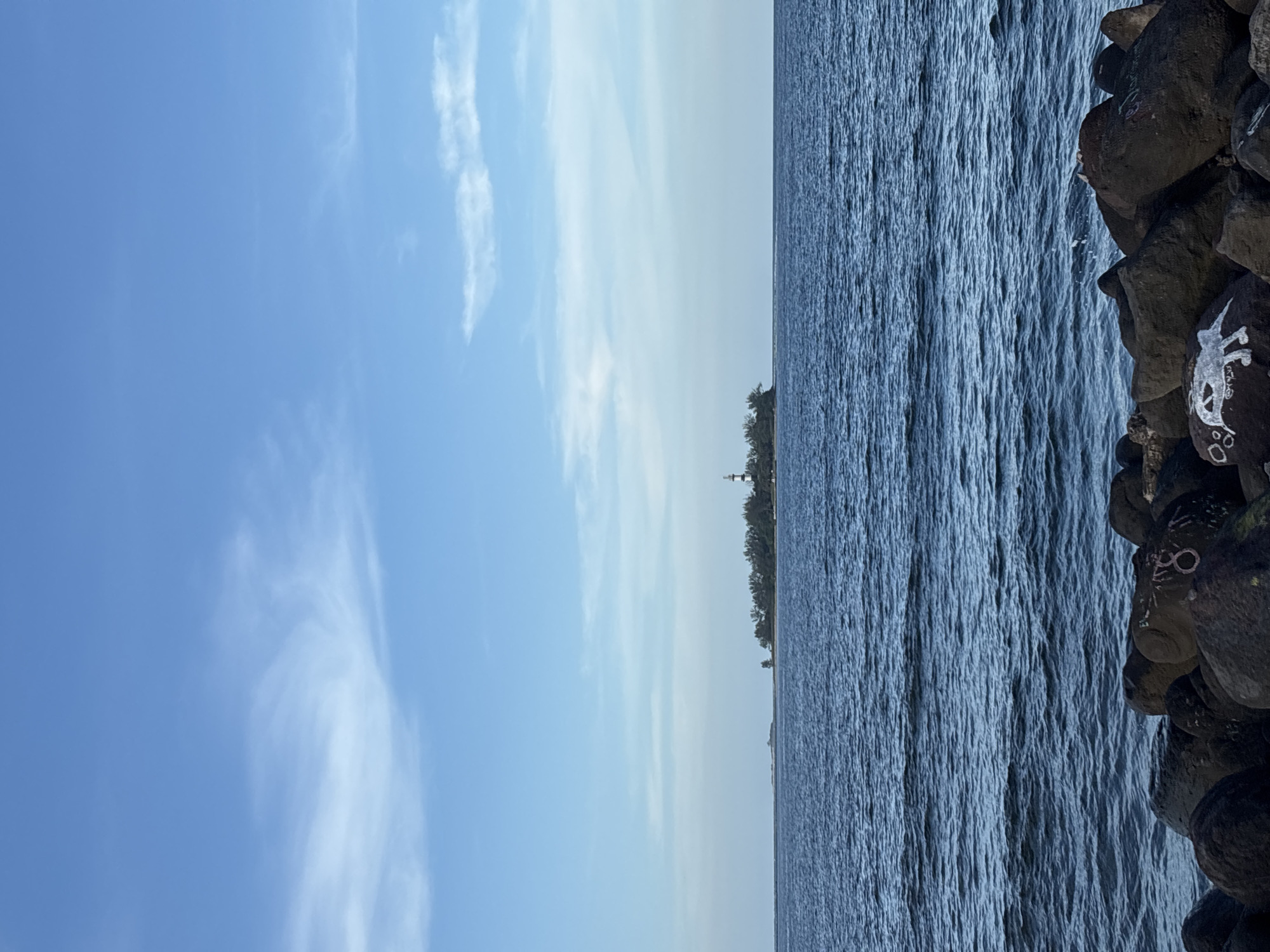 Rocky Gulf coast view with lighthouse island off Veracruz