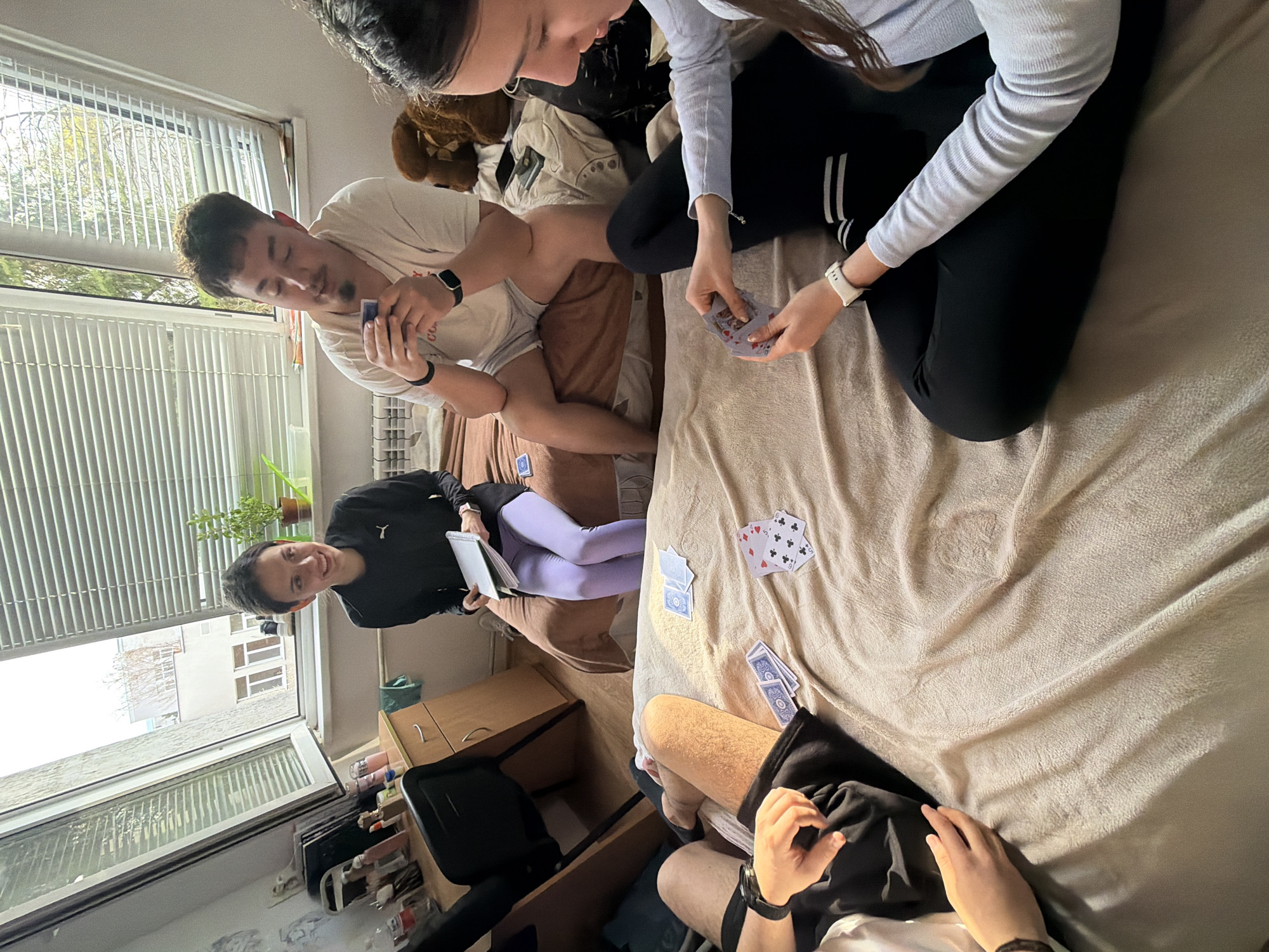 Plovdiv residents enjoy card games and car moments Tuesday afternoon