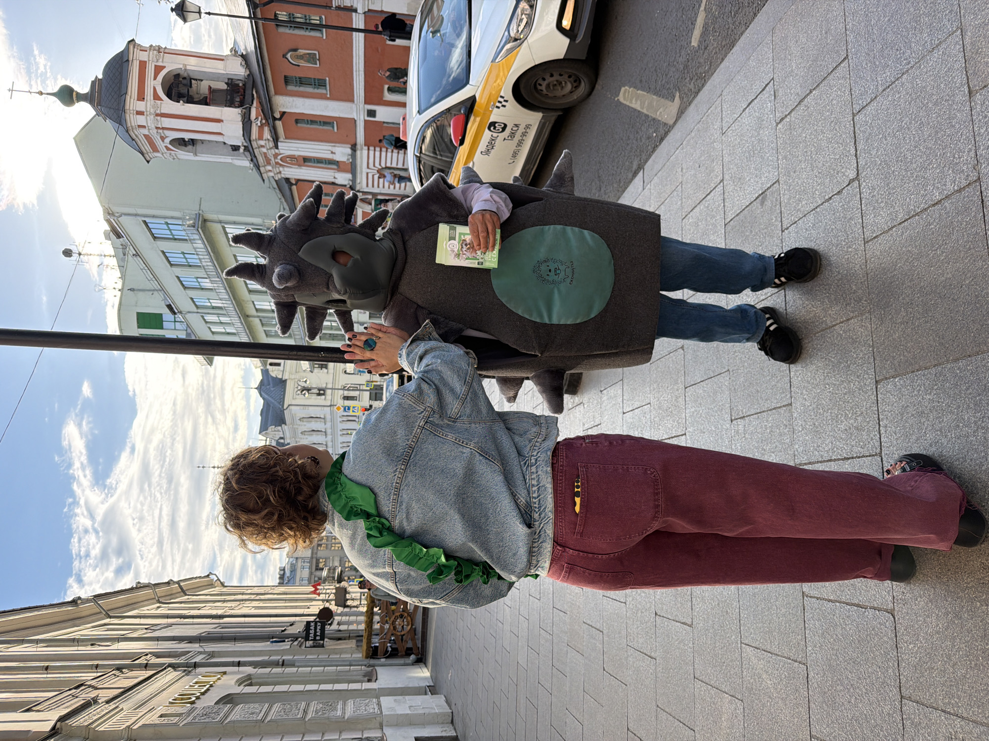 Hedgehog-costumed person spotted with cat food on Moscow street