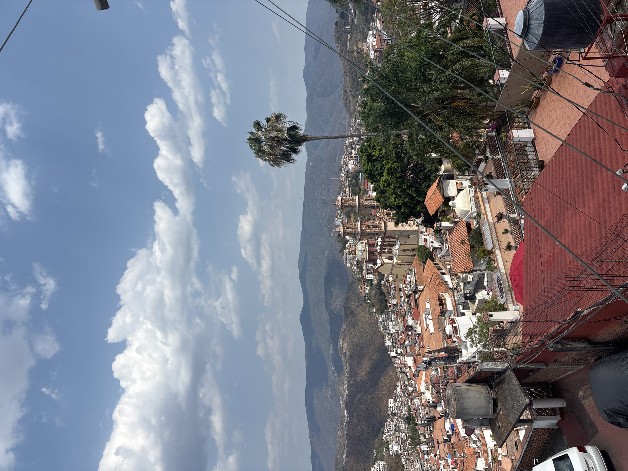 Elevated view captures Taxco's distinctive red-tiled colonial cityscape