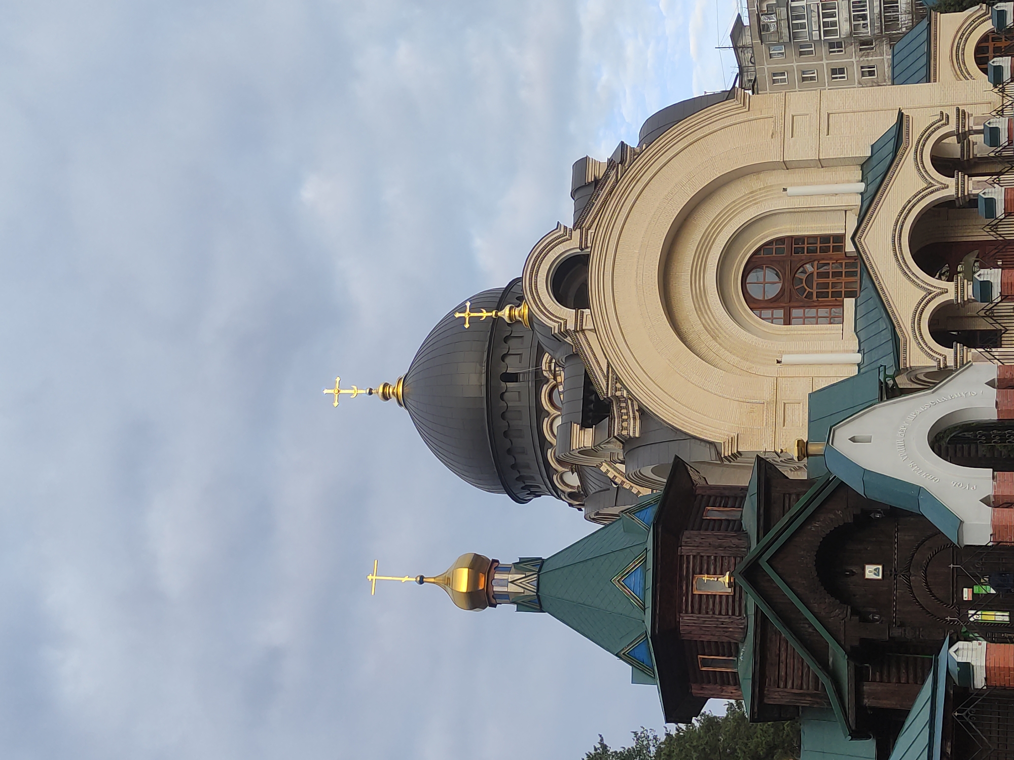 Urban church complex with distinctive domes observed April 17