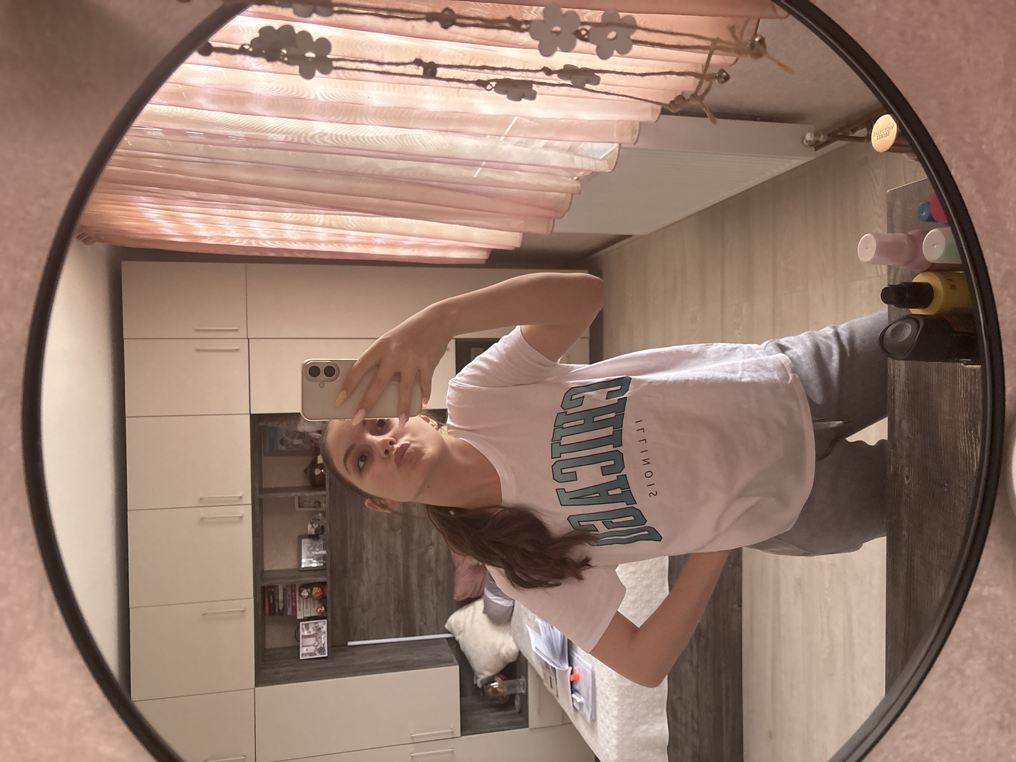 Young woman takes selfies at home in Bulgarovo, Bulgaria