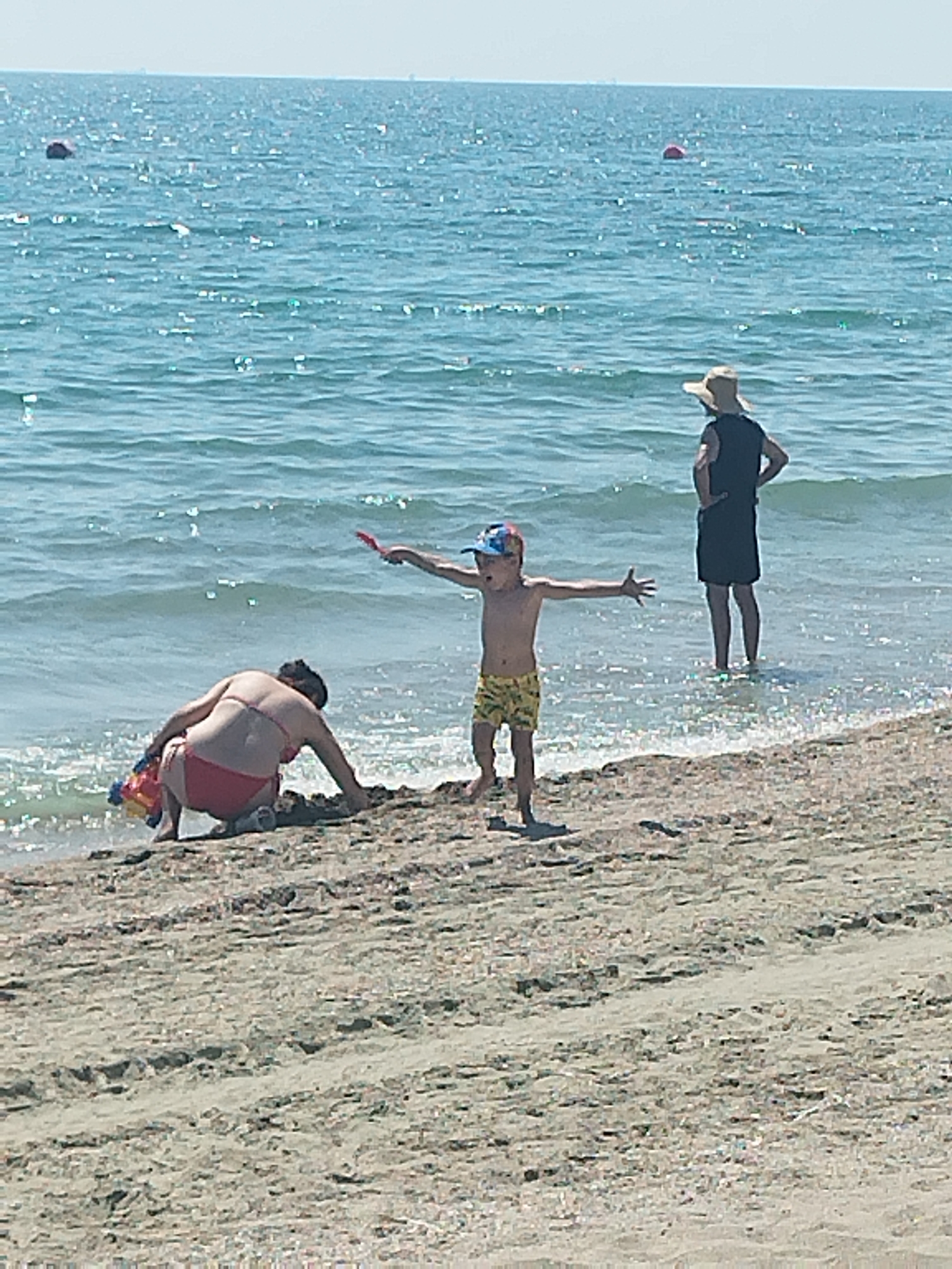 Crowded summer beach day on Romania's Black Sea coast