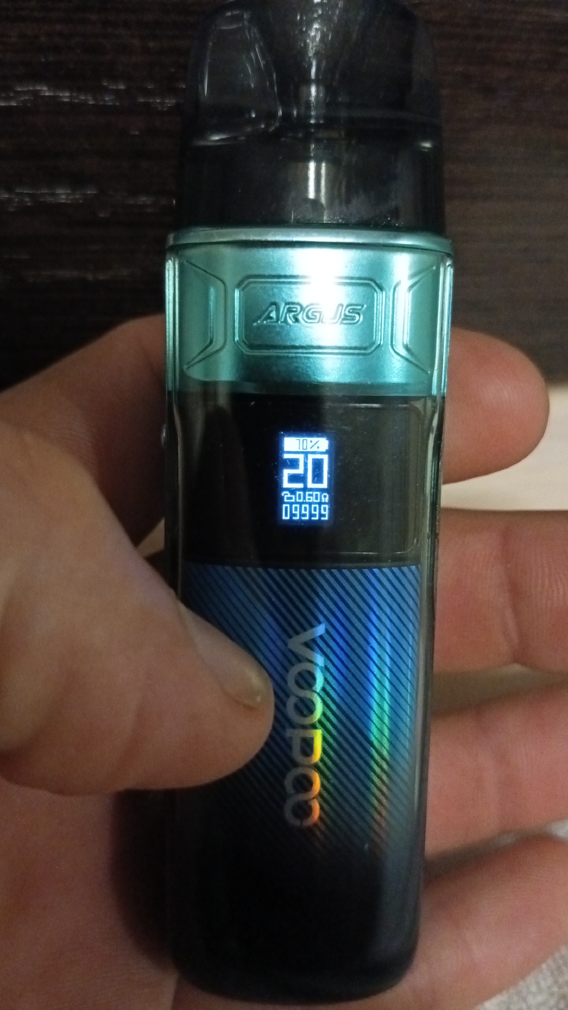Casual home snapshots in Gulkevichi: vape, TV, ceiling light
