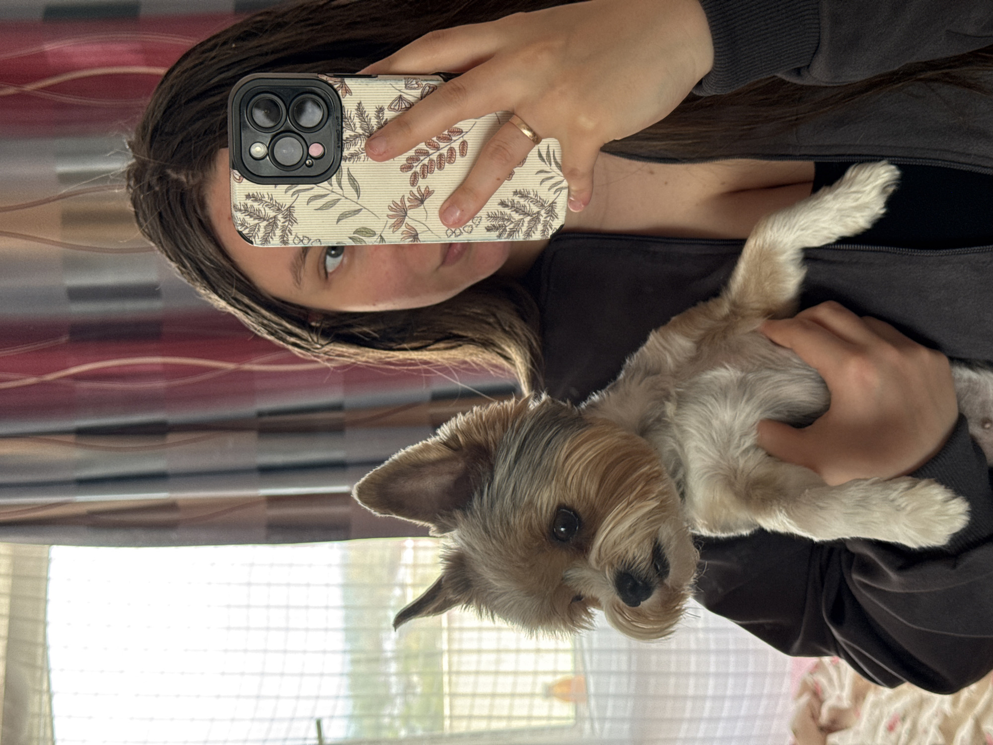 Woman documents morning routine with selfies and pet in Krasnodar