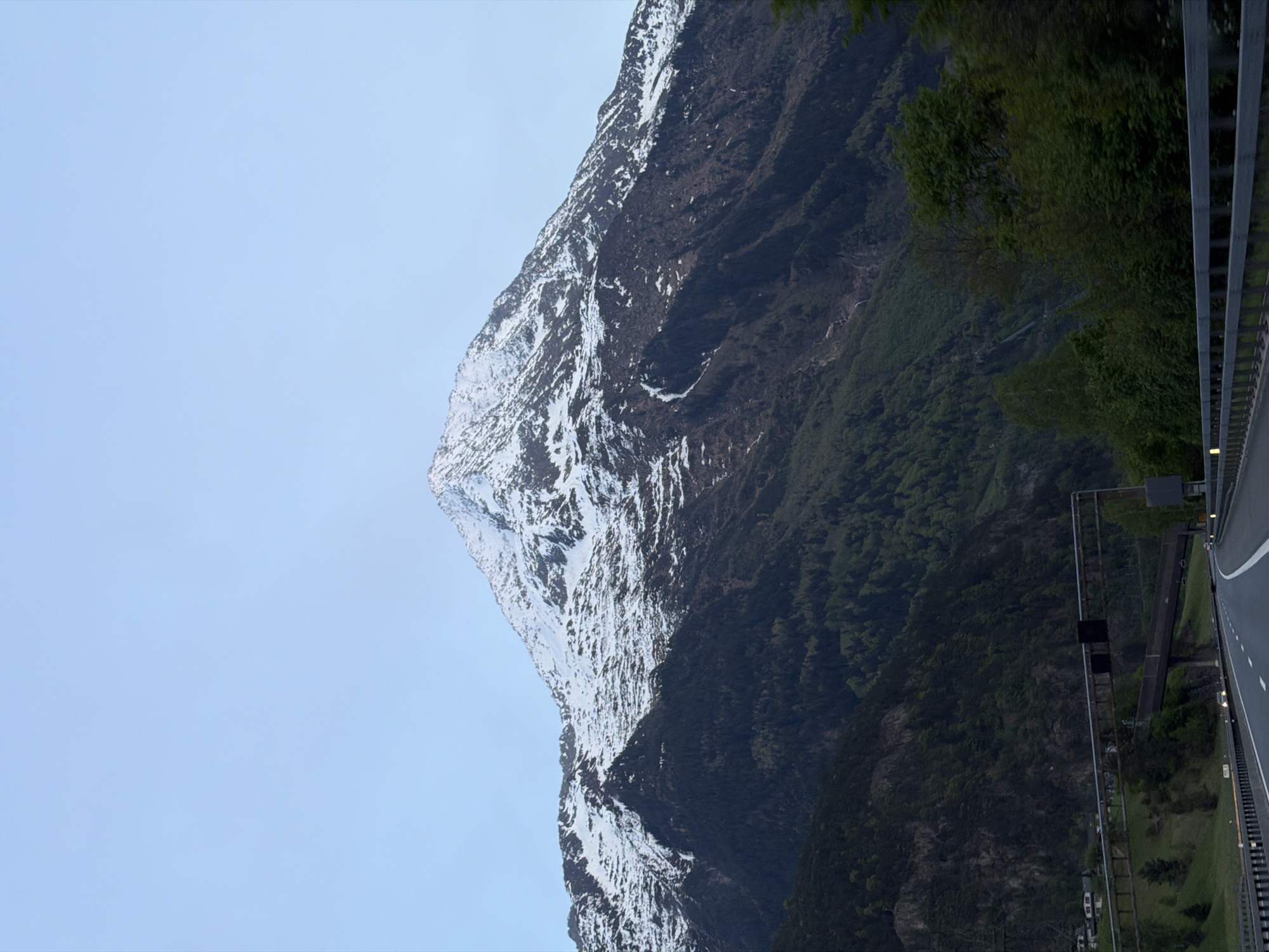 Snow-capped mountain photographed under clear skies in Amsteg, Switzerland
