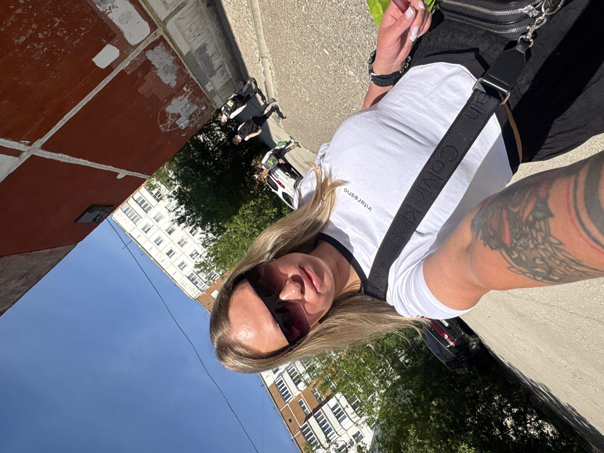Woman takes selfie on sunny morning in Perm