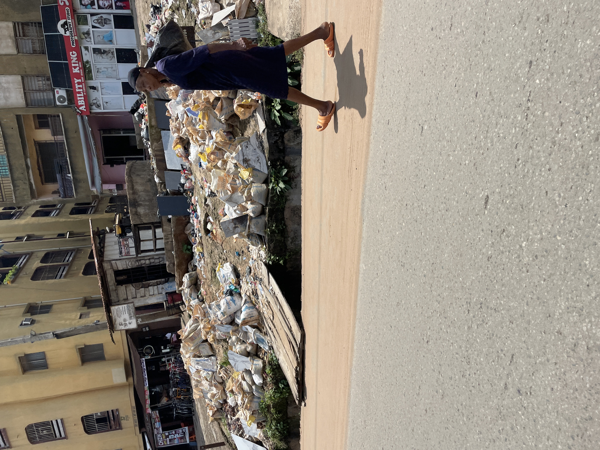 Street vendors and daily commerce captured in urban setting