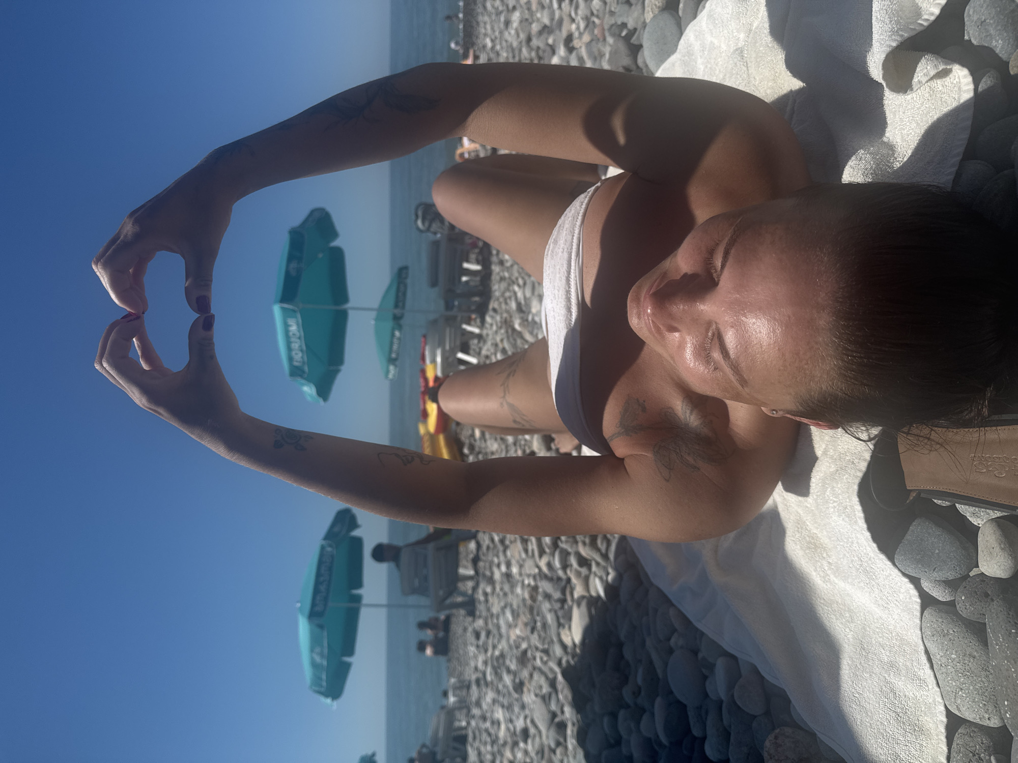 Sunny beach day on Batumi's pebble shore