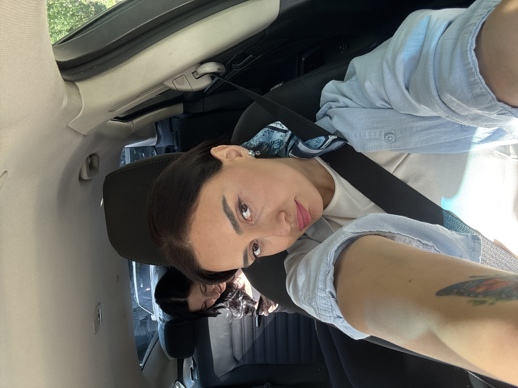 Car selfie and mirror reflection captured in Tbilisi