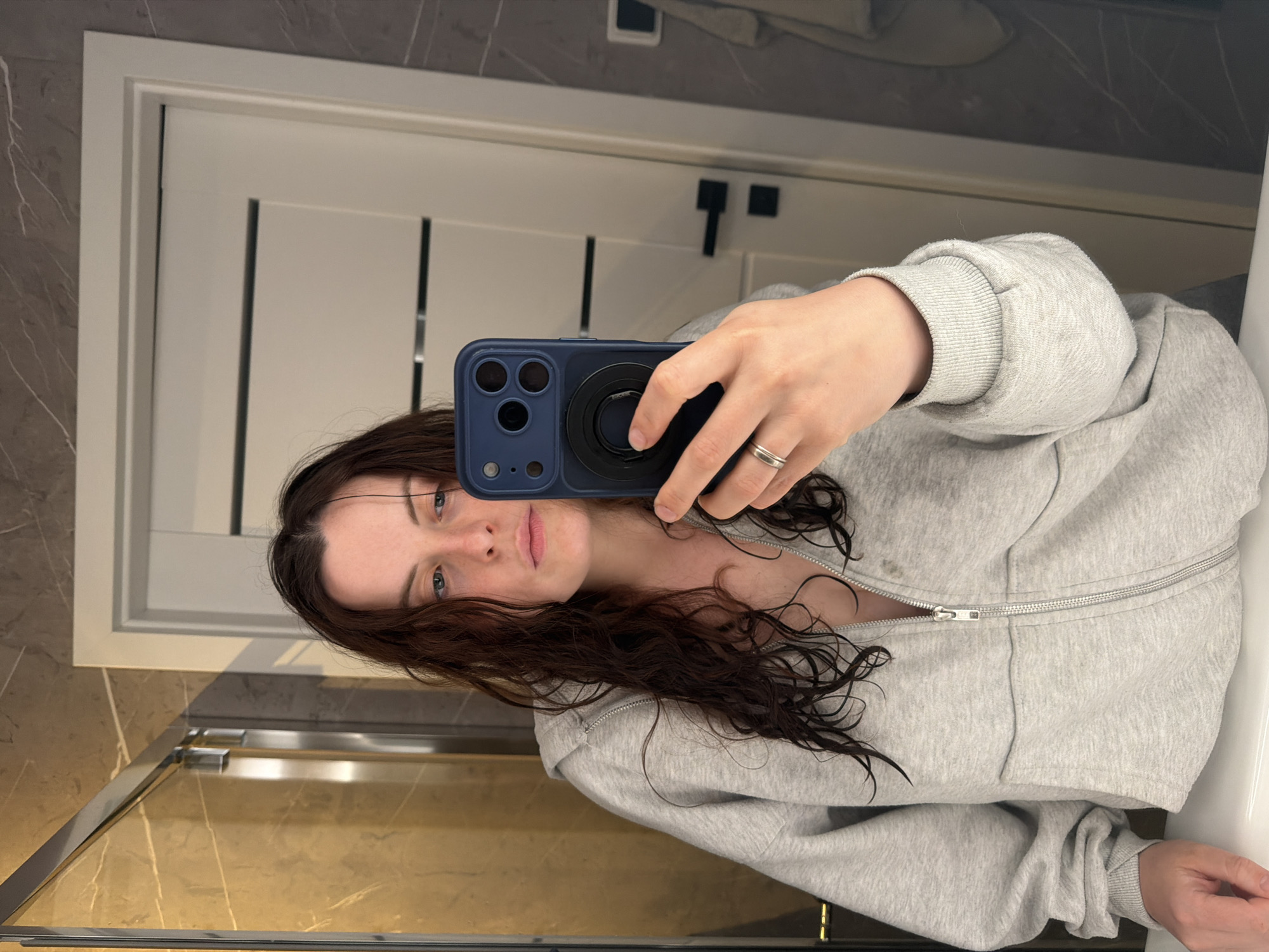 Woman takes bathroom selfies in Gangloff, Germany